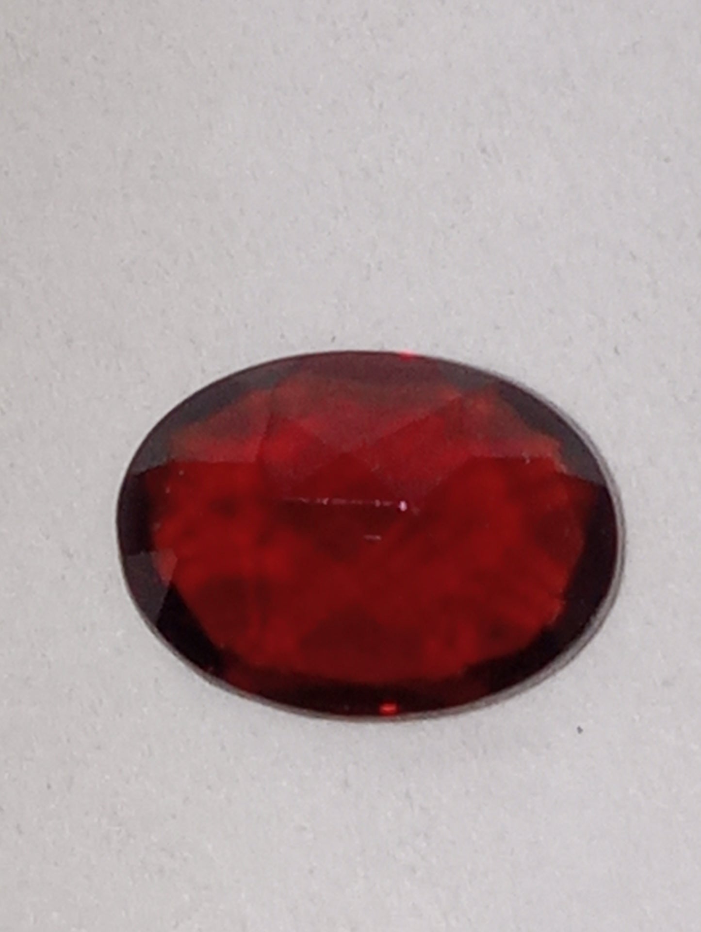 garnet gemstones red, Orissa, 8mmx6mm oval cut, 1.45ct