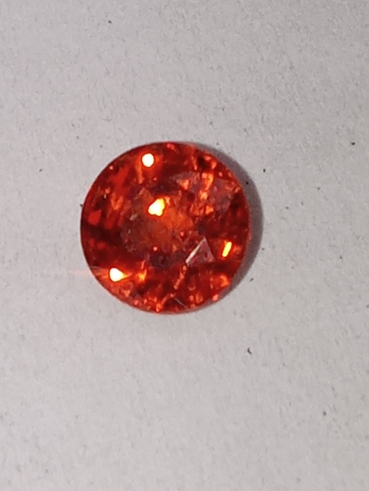 garnet gemstone spessartite, orange 5mm round cut, .80ct