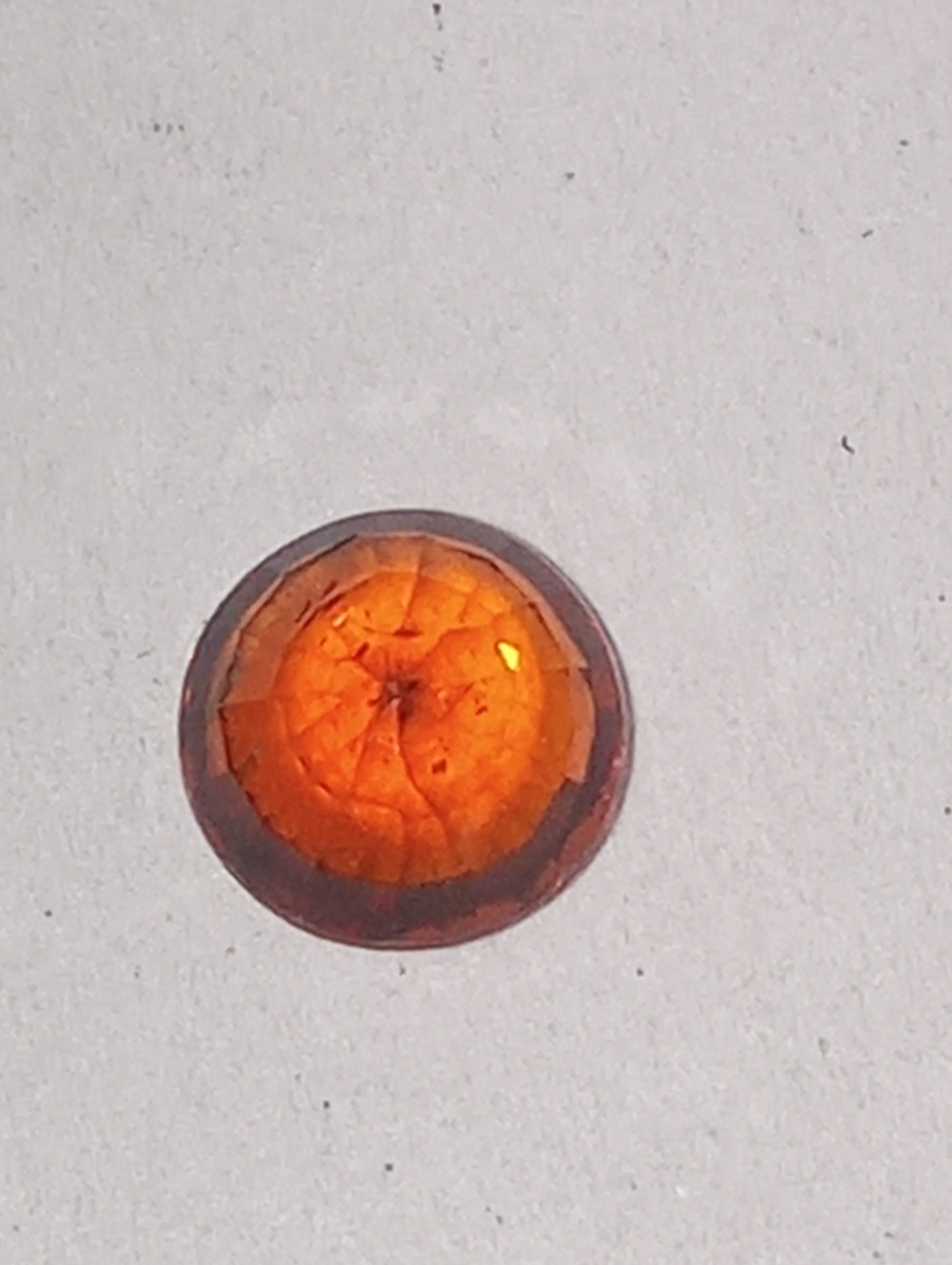 garnet gemstone spessartite, orange 5mm round cut, .80ct