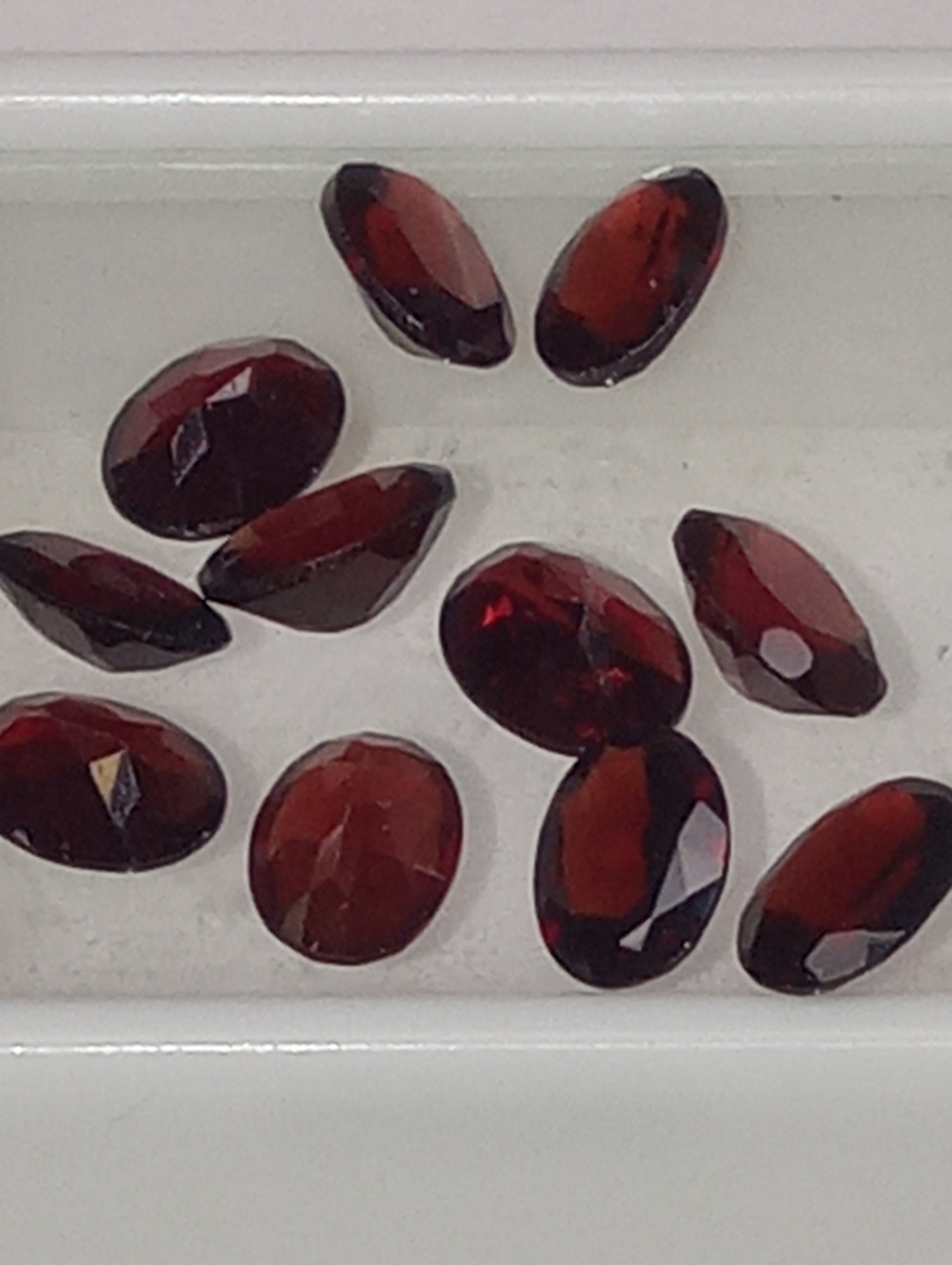 garnet gemstones, red, Orissa, 8mmx6mm oval cut,  11 stones