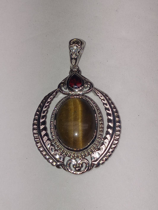pendant tiger's eye, Mozembique garnet, in platinum over copper with magnet, 10.25ctw