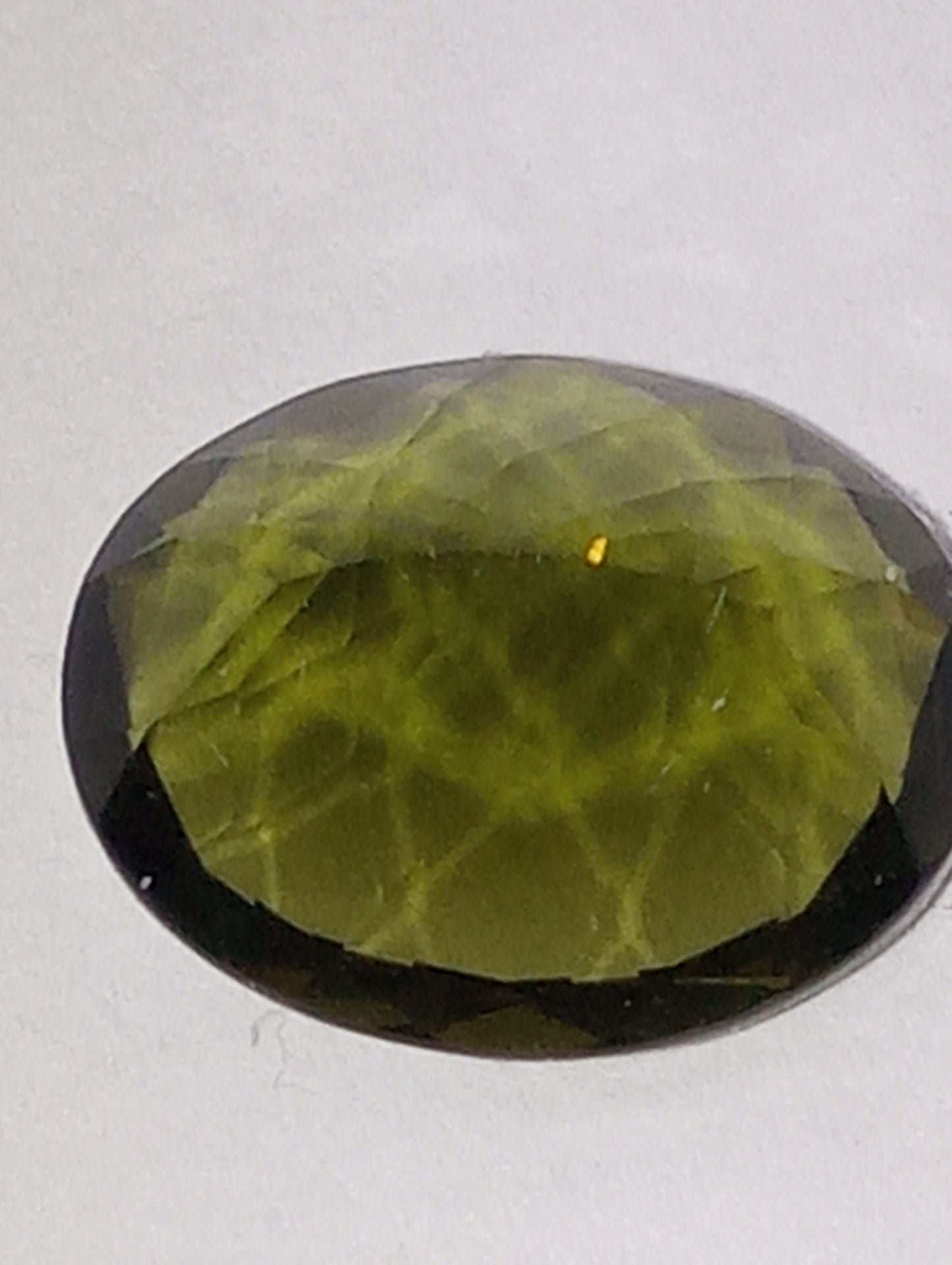 moldavite gemstone, 11mmx9mm oval cut, 3.00ct