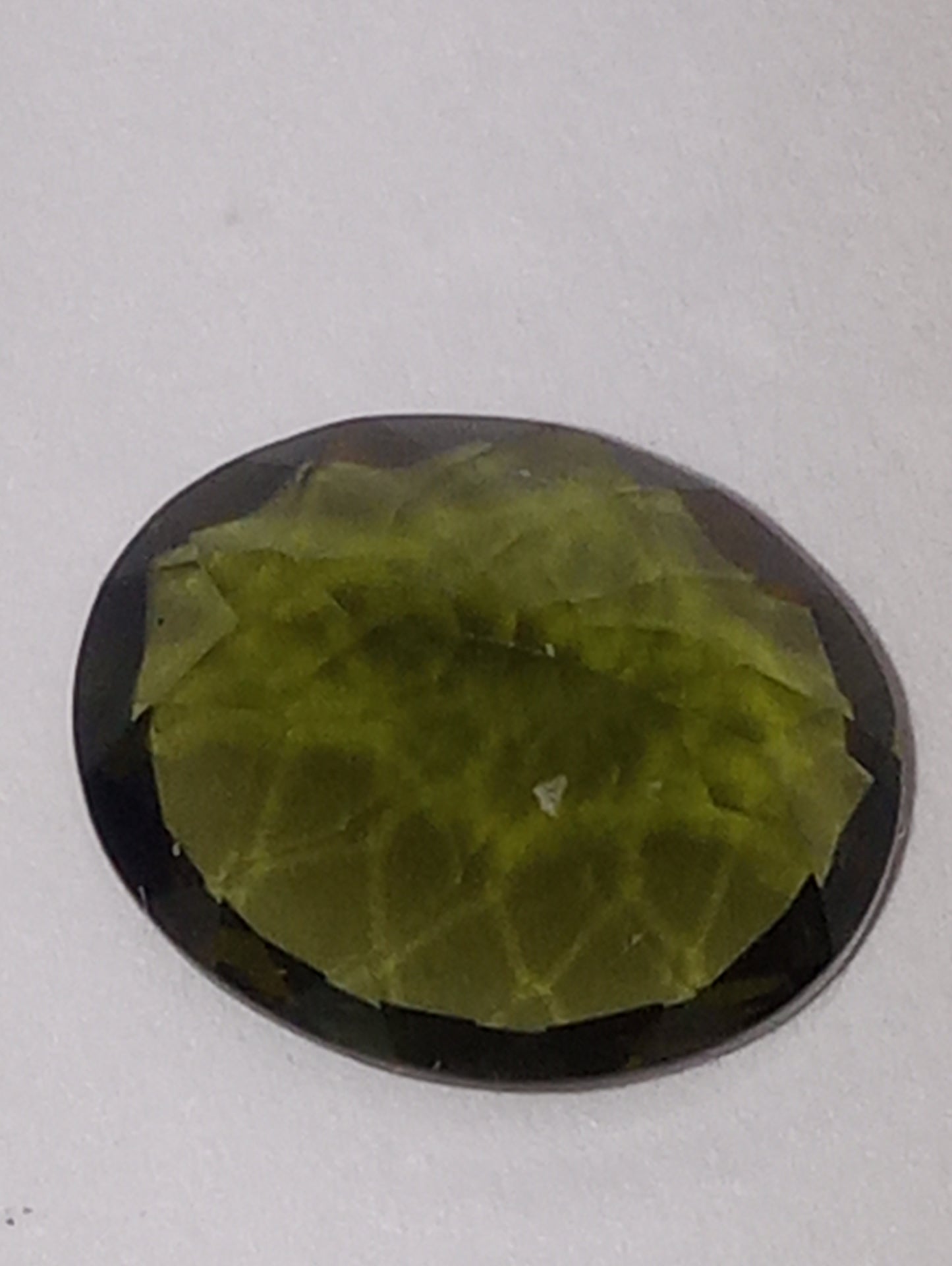 moldavite gemstone, 11mmx9mm oval cut, 3.19ct