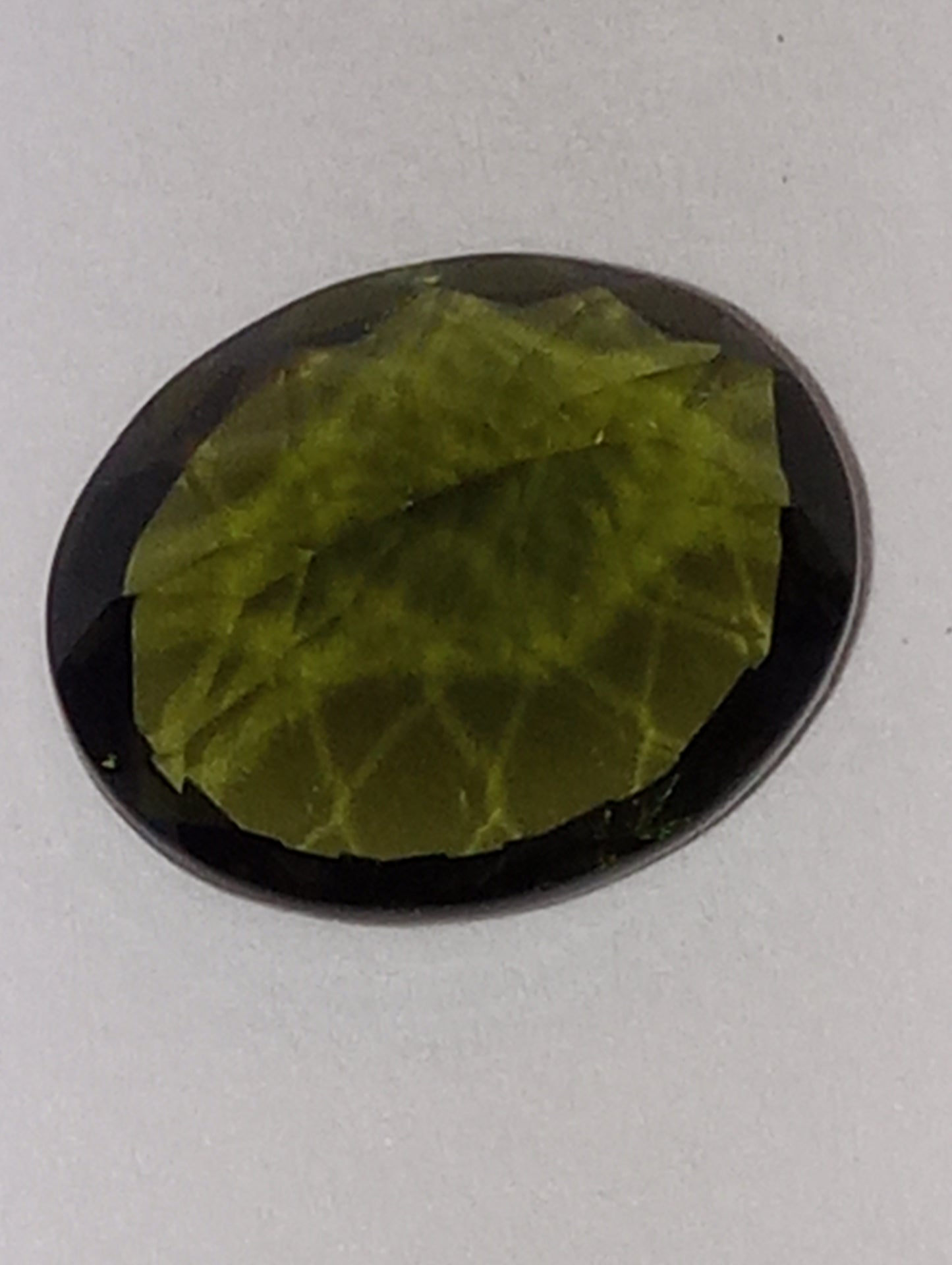 moldavite gemstone,11mmx9mm oval cut, 3.20ct