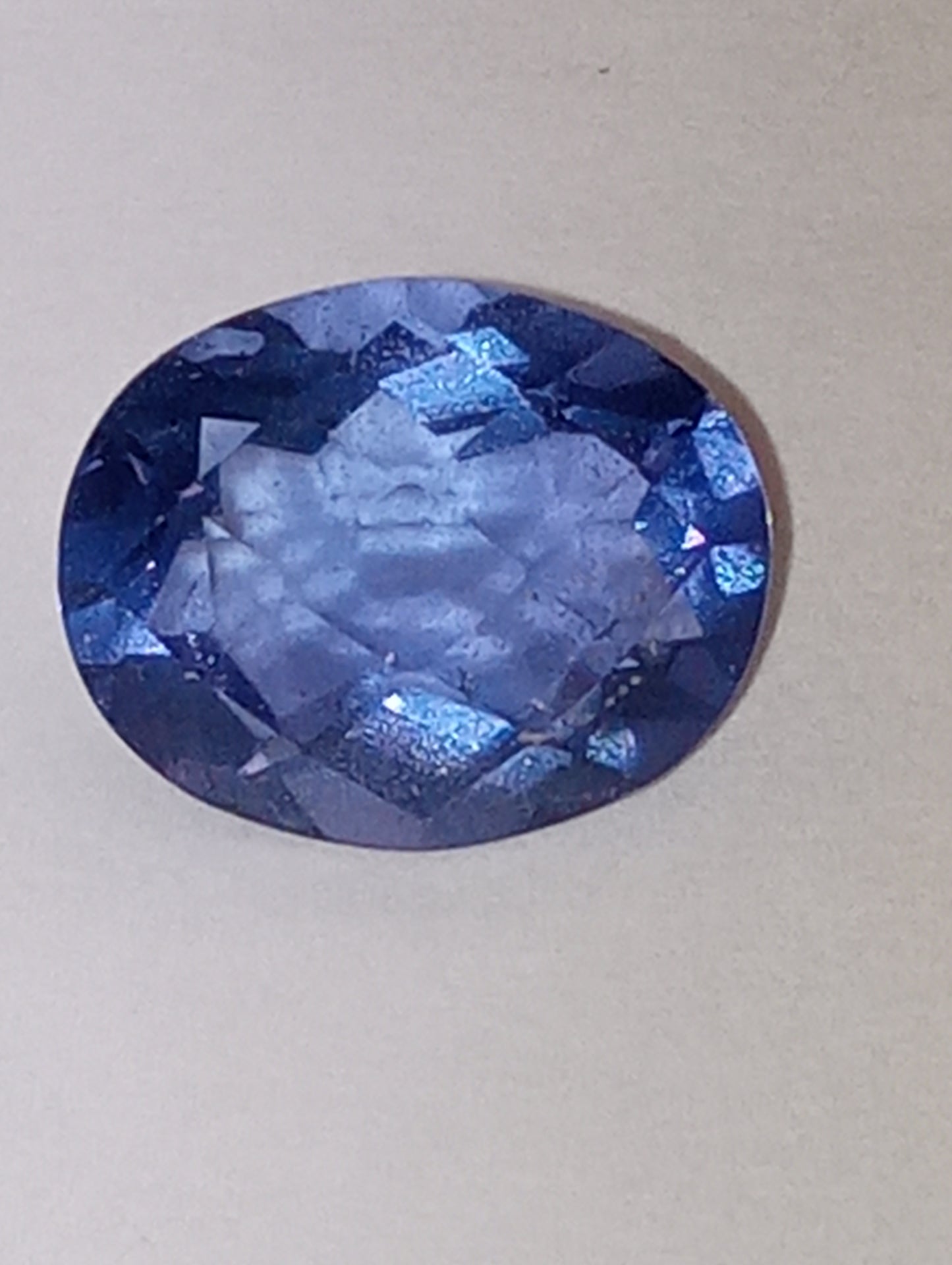 fluorite gemstone blue-purple color shift, 11mmx9mm oval cut, 4.21cts