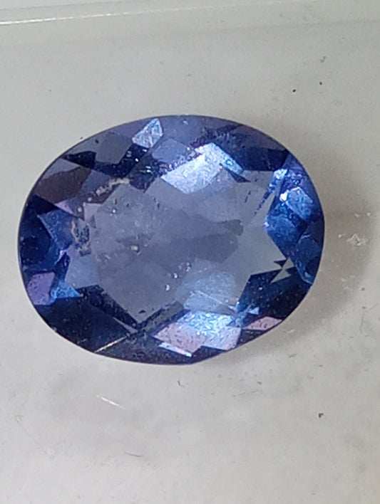 fluorite gemstone blue-purple color shift, 11mmx9mm oval cut, 4.21cts