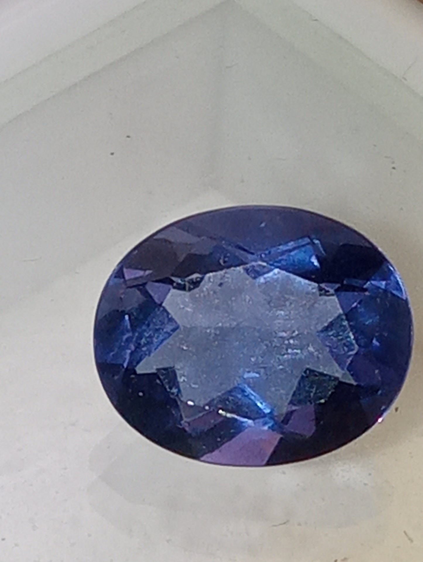 fluorite gemstone blue-purple color shift, 11mmx8mm oval cut, 4.20ct