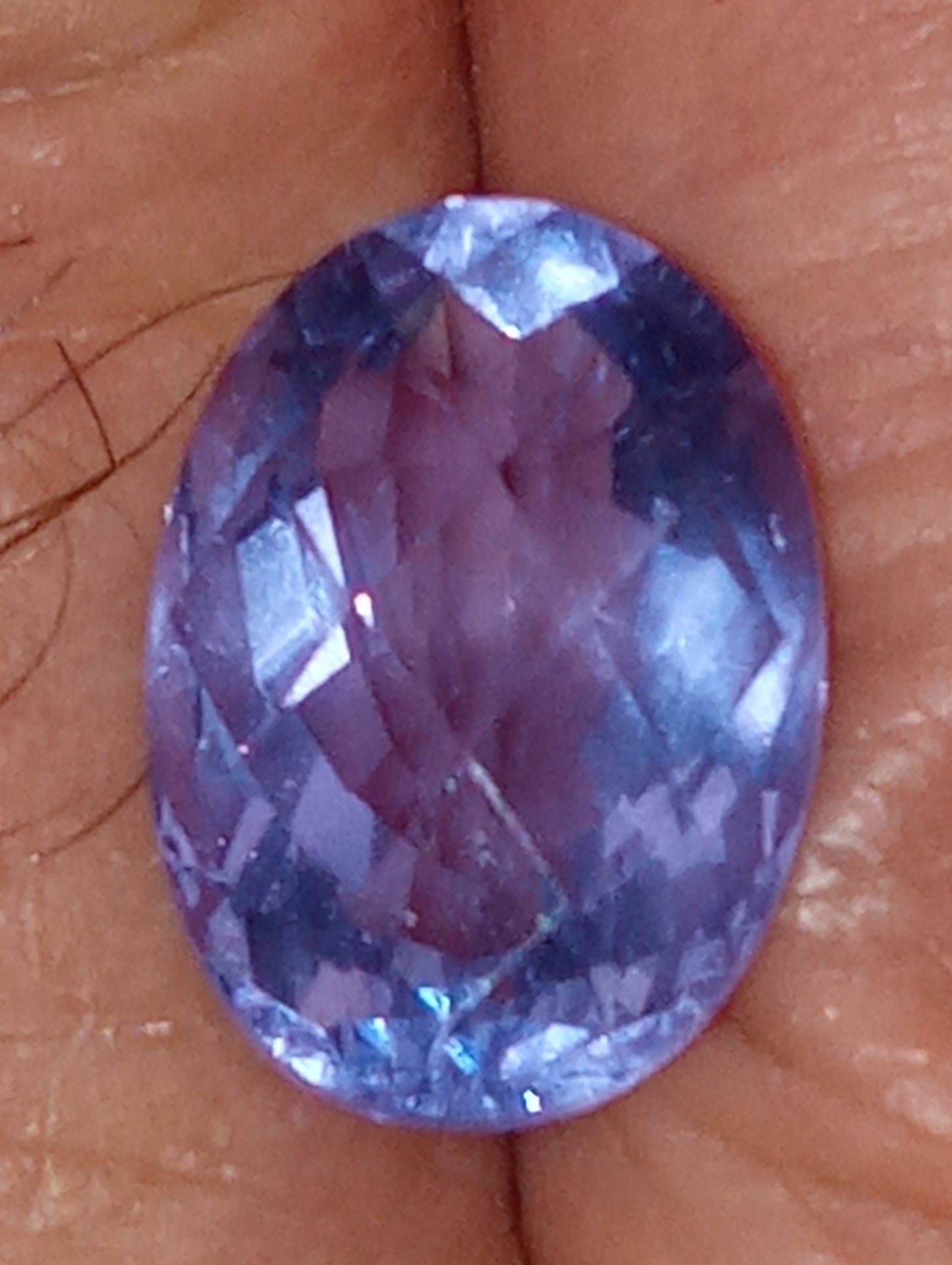 fluorite gemstone, color-shift blue-purple, 14mmx10mm oval cut, 8.82ct