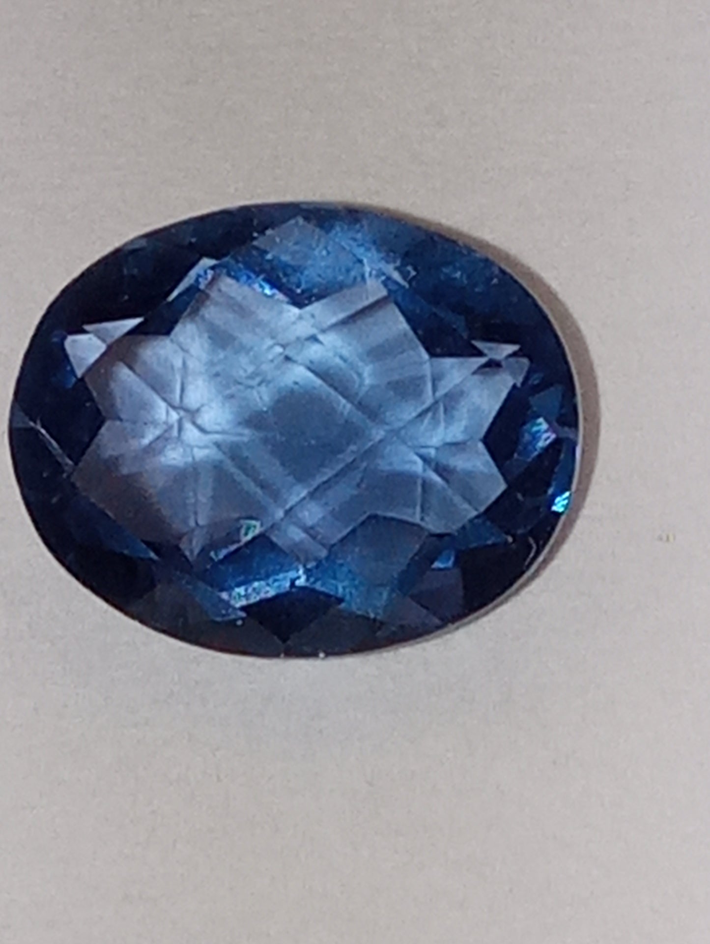 fluorite gemstone, color shift, blue-purple, 10mmx8mm oval cut, 2.82ct