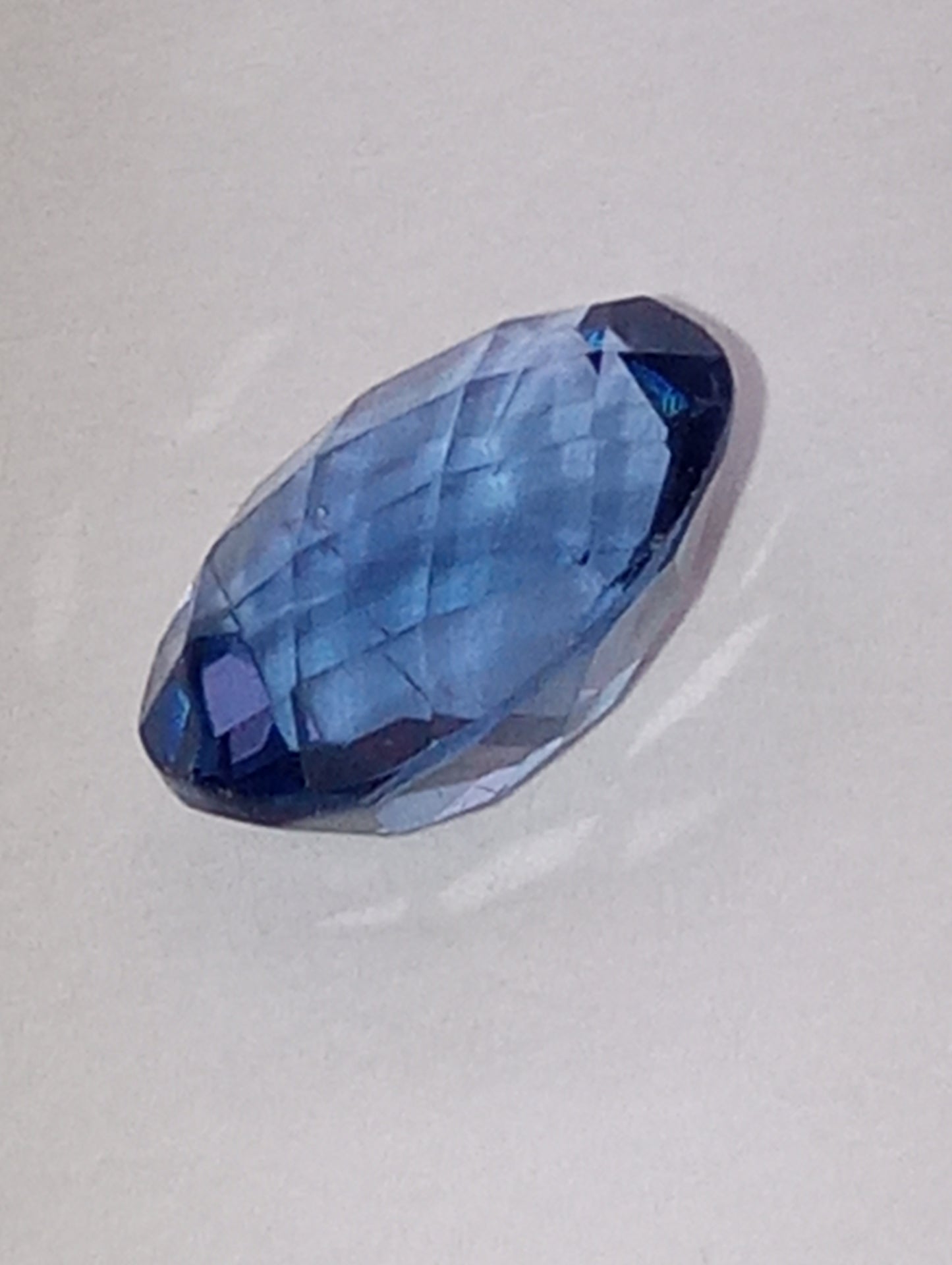 fluorite gemstone, color shift, blue-purple, 10mmx8mm oval cut, 2.82ct