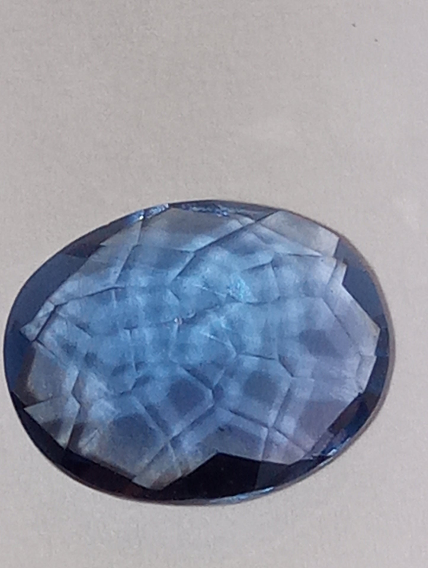 fluorite gemstone, color shift, blue-purple, 10mmx8mm oval cut, 2.82ct