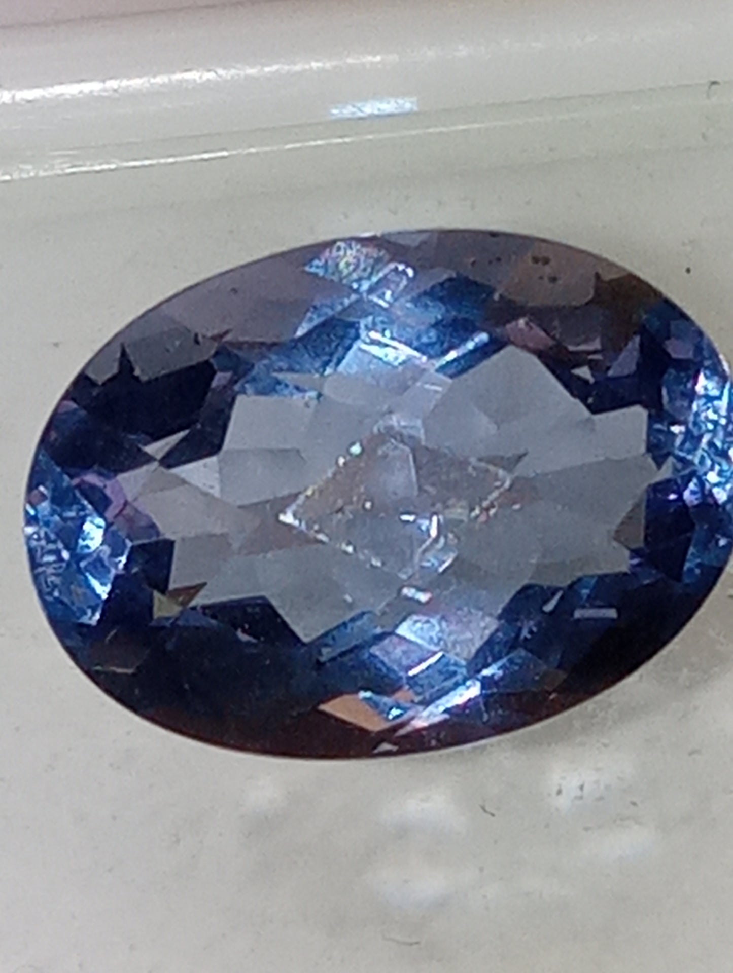 fluorite gemstone, color shift, blue-purple, 14mmx10mm, 7.95ct