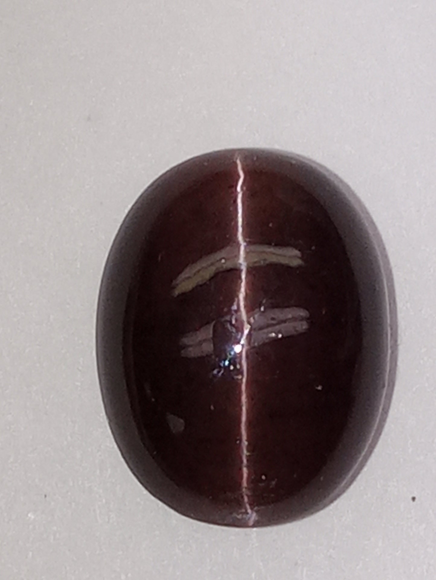 spectrolite gemstone, cats-eye cabachon cut oval, 12.28ct