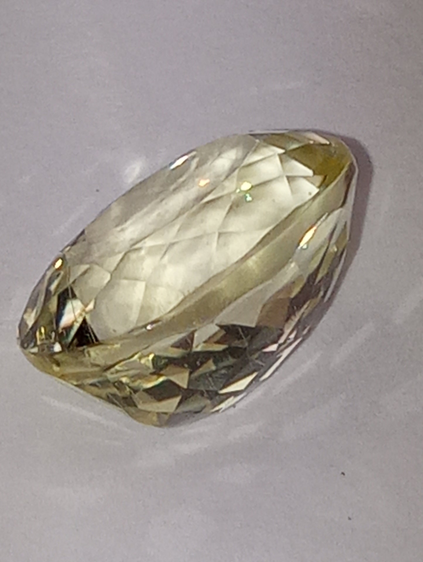 Teradora (TM)  gemstone, yellow, 14x10mm oval cut, 8.43ct