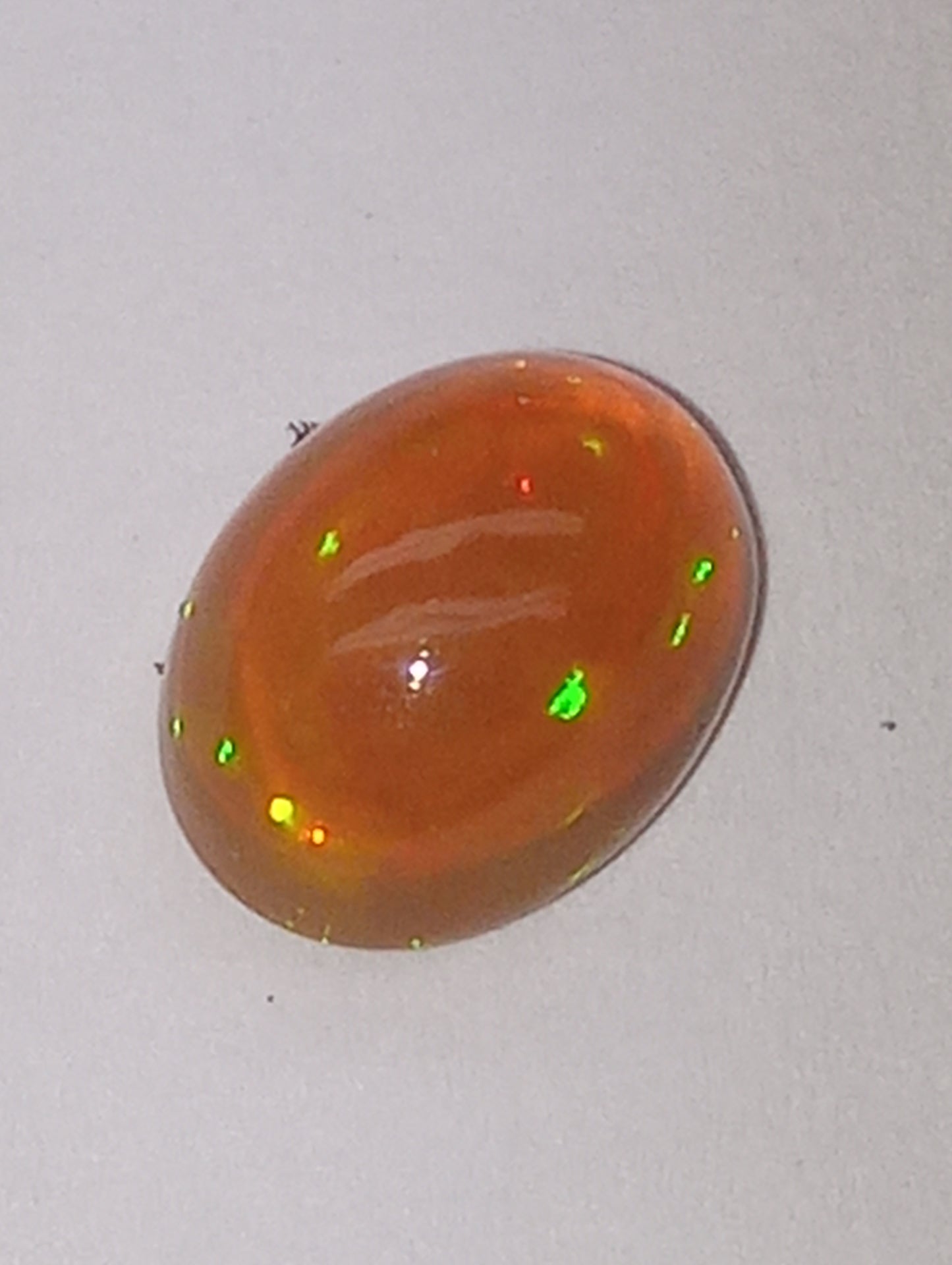 opal gemstone Ethiopian, 9mmx7mm oval cab, 1.32ct