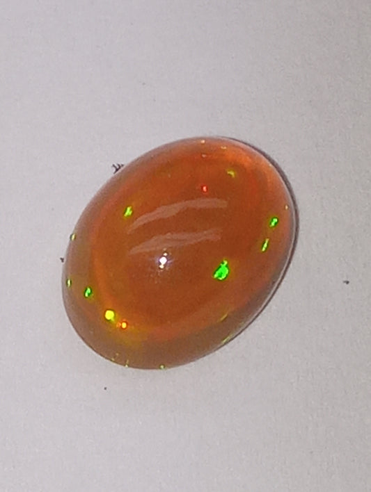opal gemstone Ethiopian, 9mmx7mm oval cab, 1.32ct