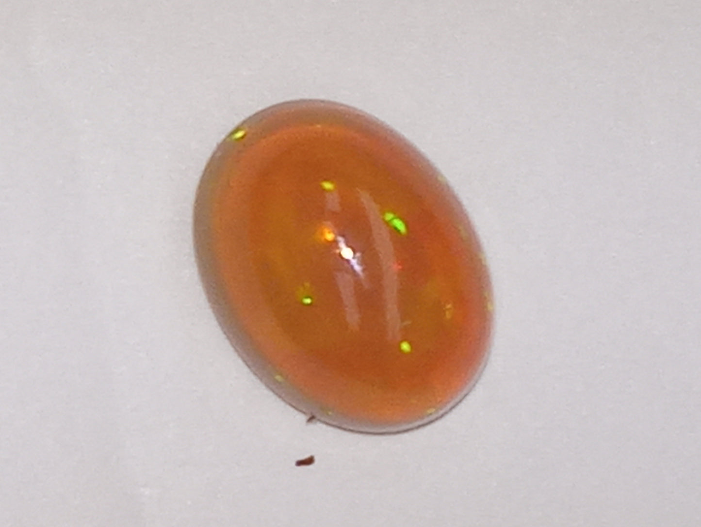 opal gemstone Ethiopian, 9mmx7mm oval cab, 1.32ct