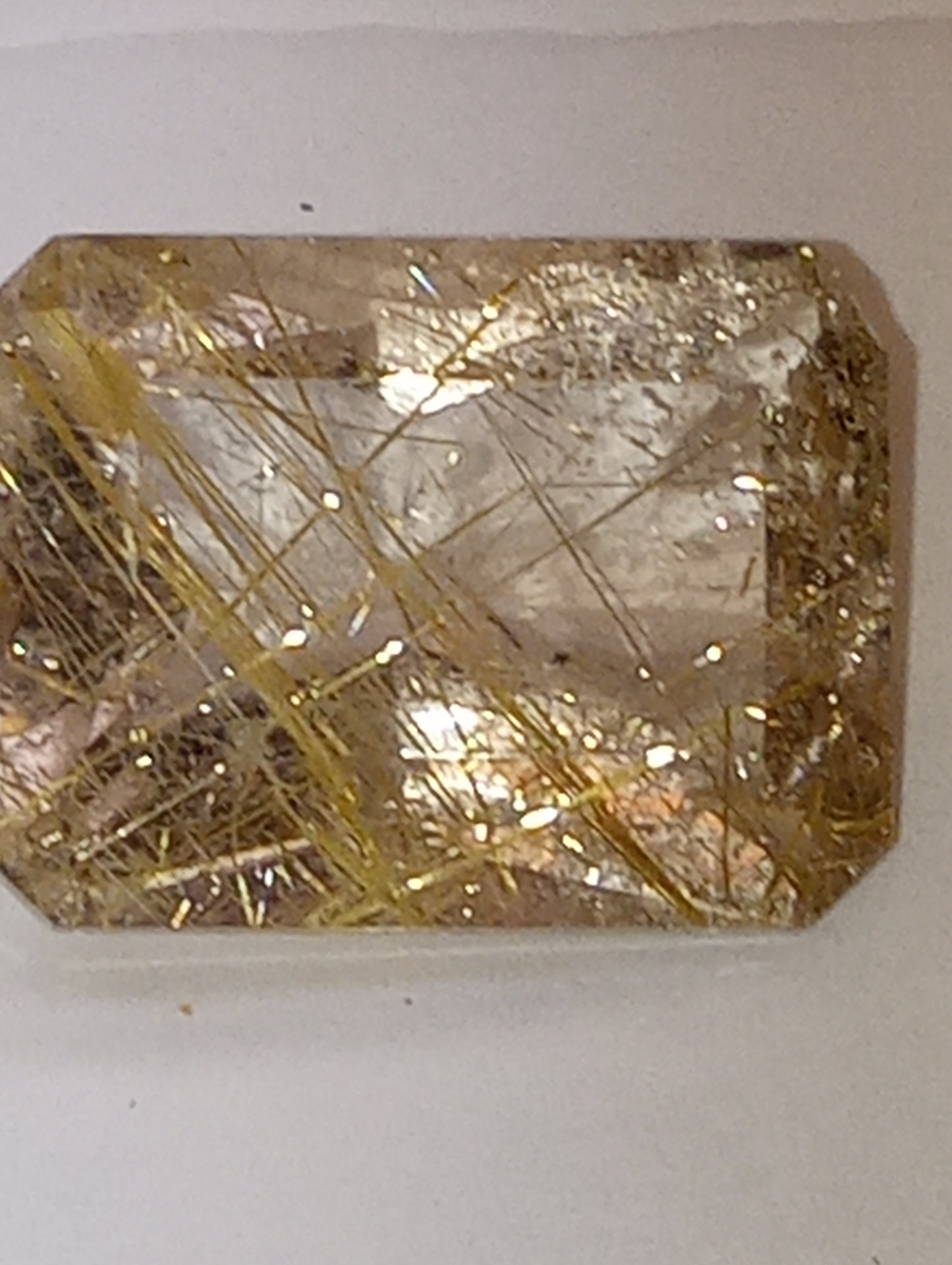 quartz gemstone rutilated, 20mmx15mm faceted emerald cut, 20.68ct