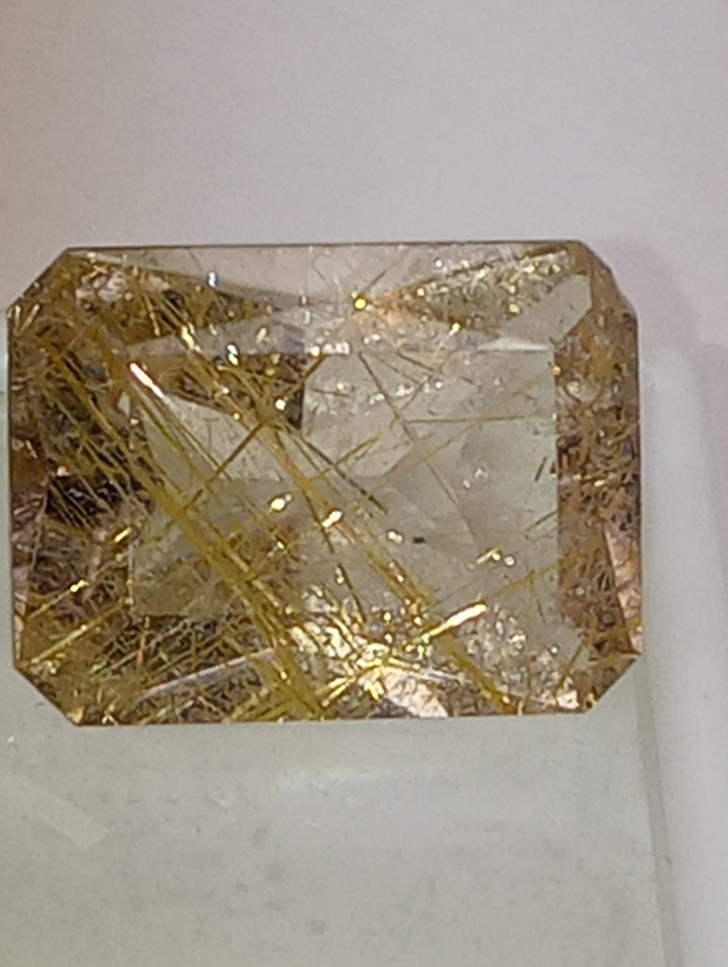 quartz gemstone rutilated, 20mmx15mm faceted emerald cut, 20.68ct