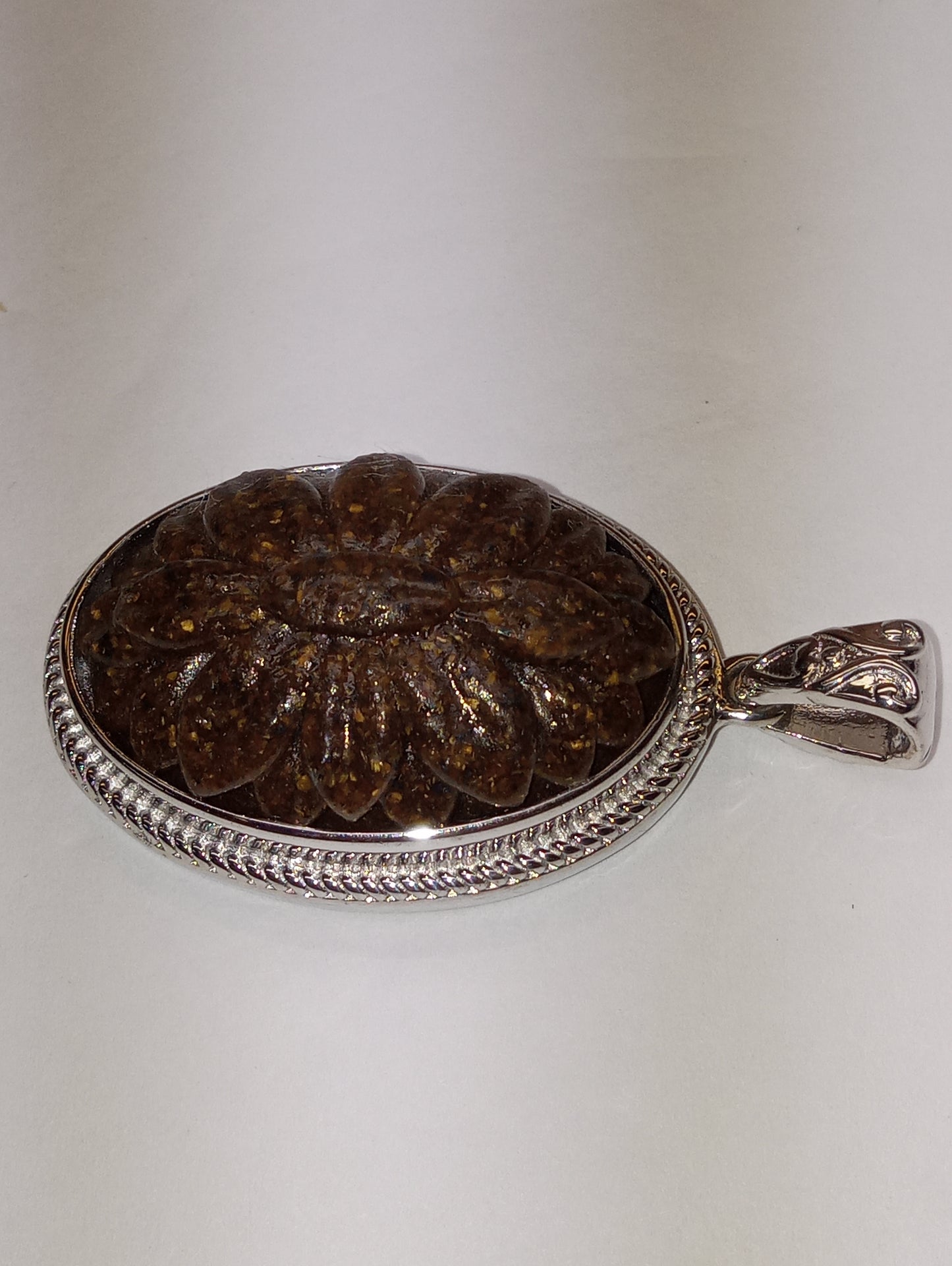 pendant, tiger's eye South African, carved in platinum over copper, with magnet, 18.15ct