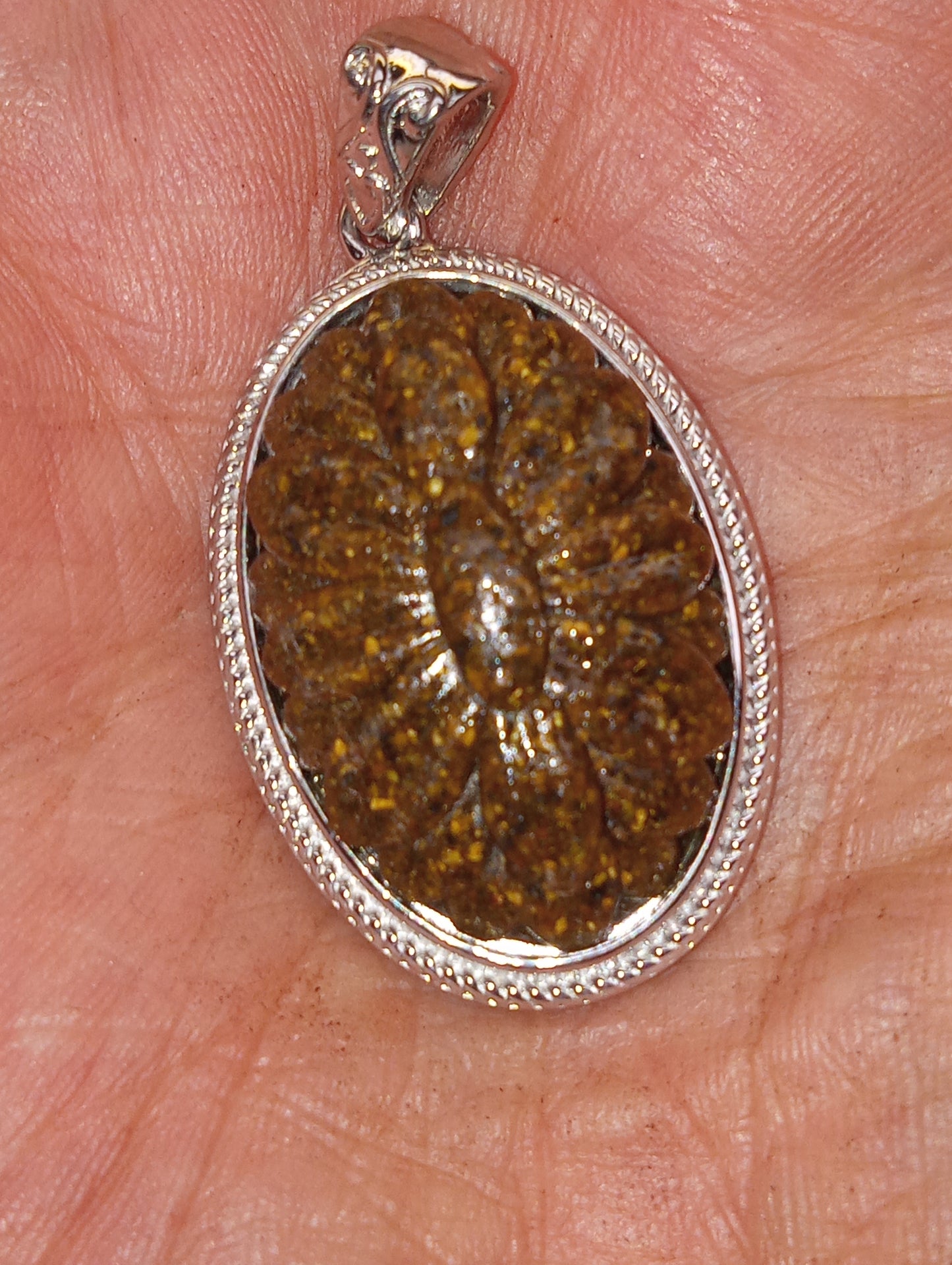 pendant, tiger's eye South African, carved in platinum over copper, with magnet, 18.15ct