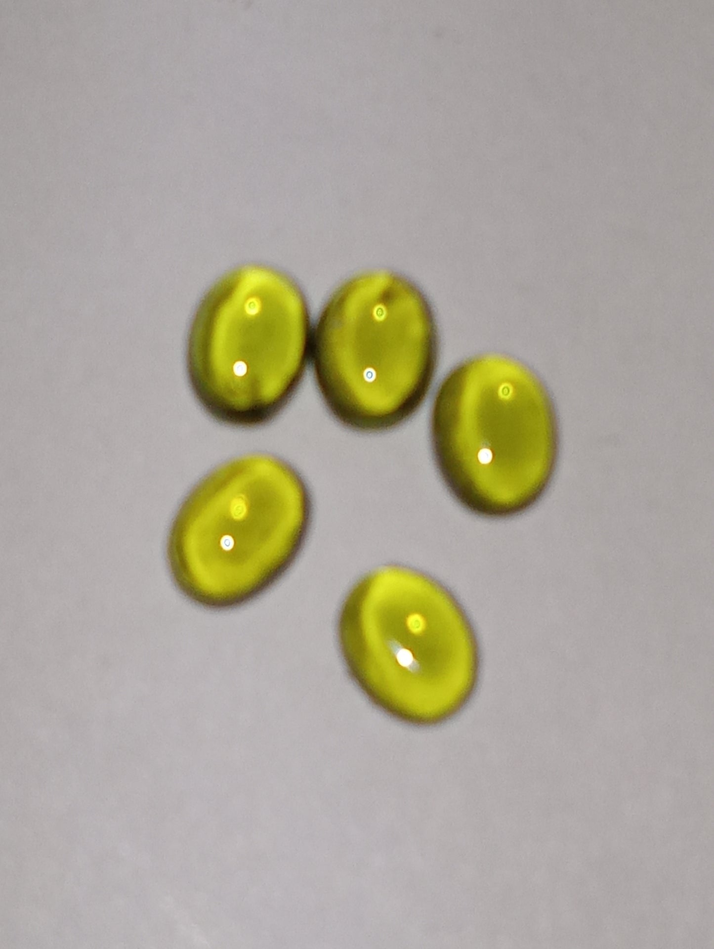 Vesuvianite gemstones, 4mm x3mm oval cuts, 5 stones, 1.00ctw