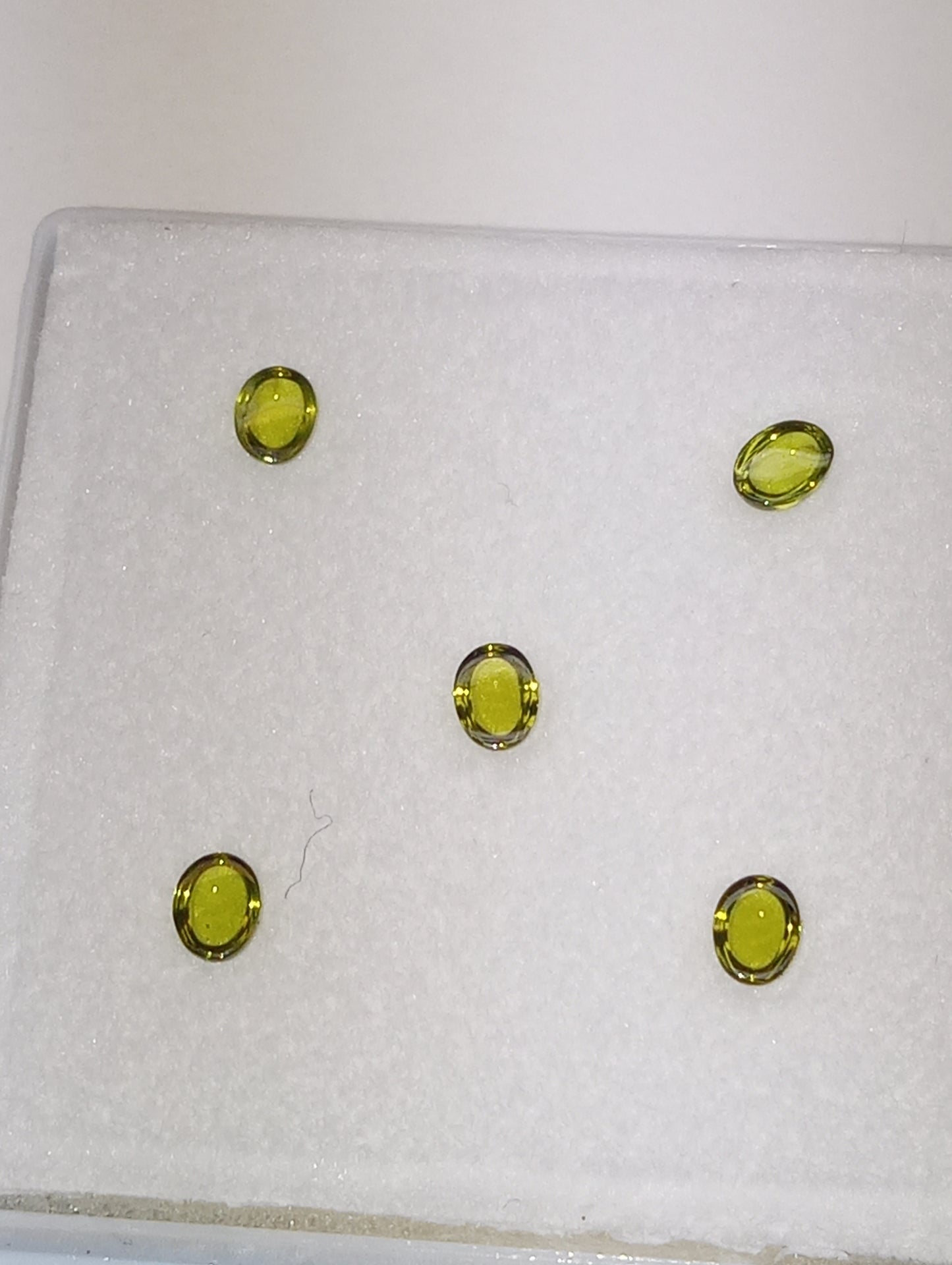 Vesuvianite gemstones, 4mm x3mm oval cuts, 5 stones, 1.00ctw