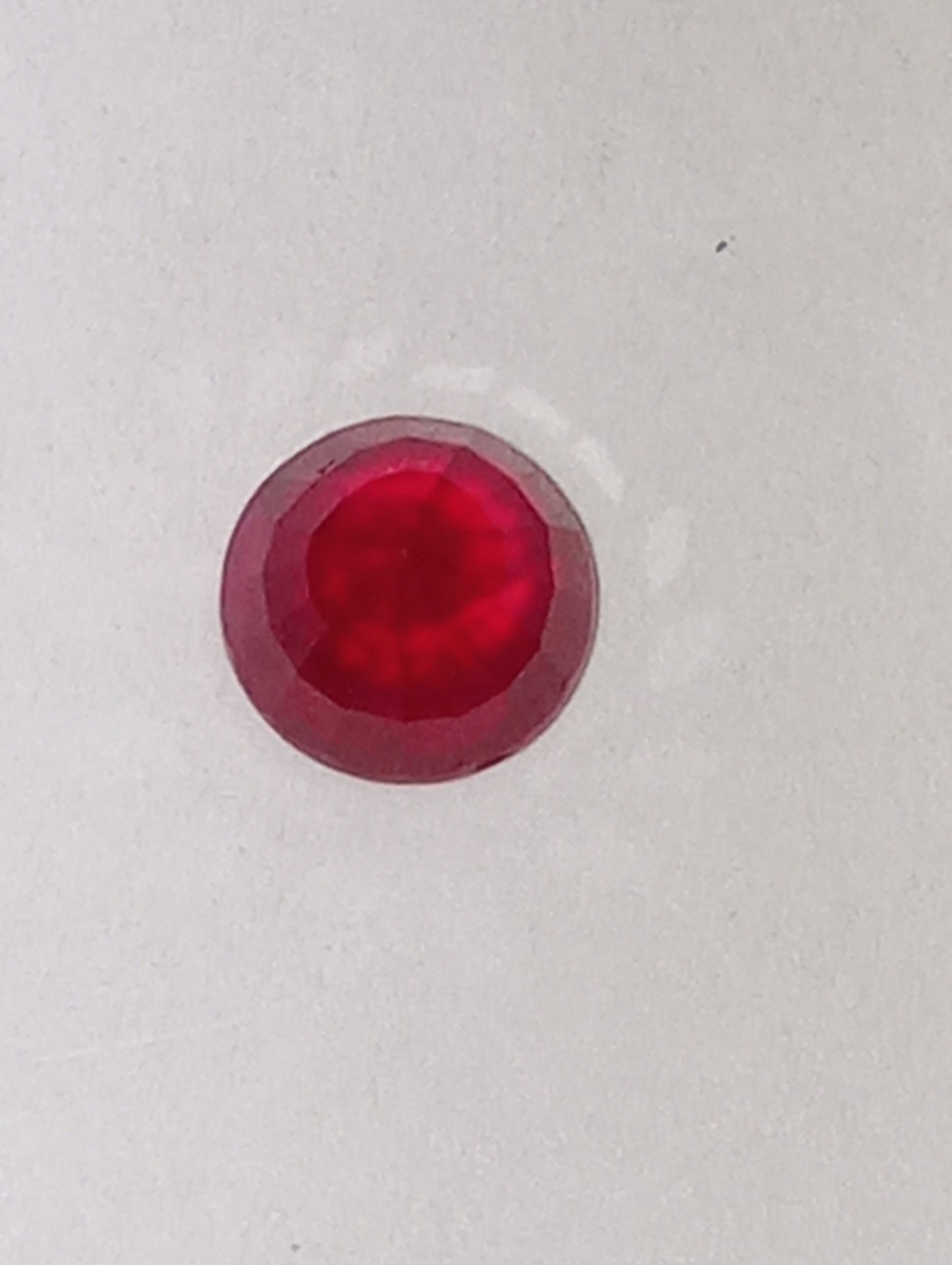 ruby gemstone Burma, 5.25mm round cut, .92ct, deep cut