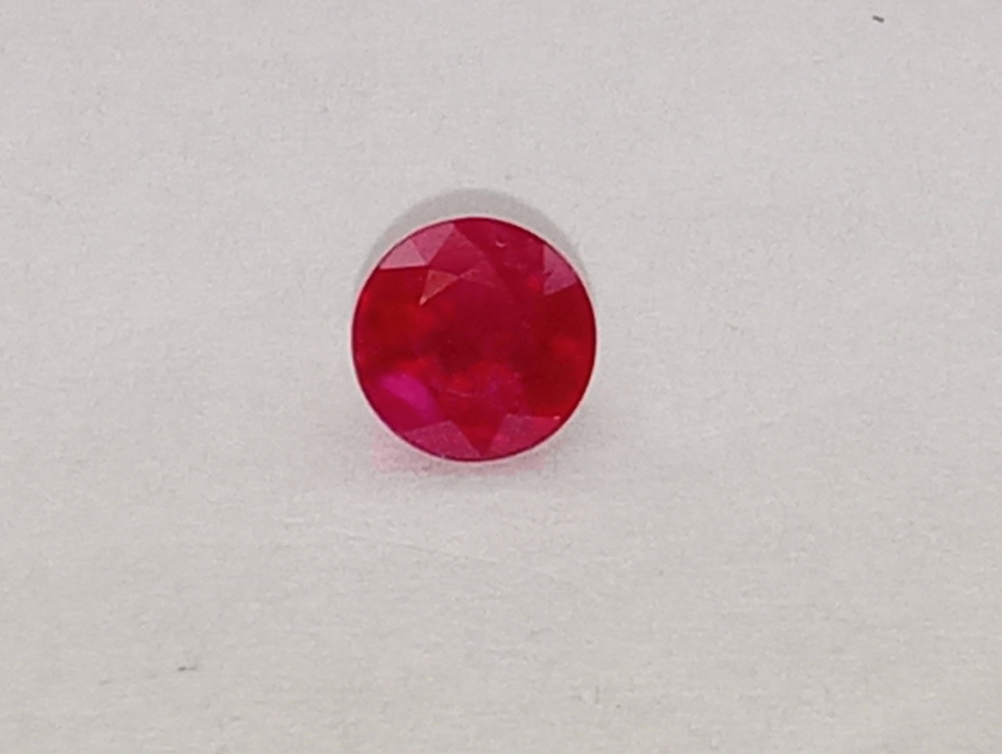 ruby gemstone Burma, 5.25mm round cut, .92ct, deep cut