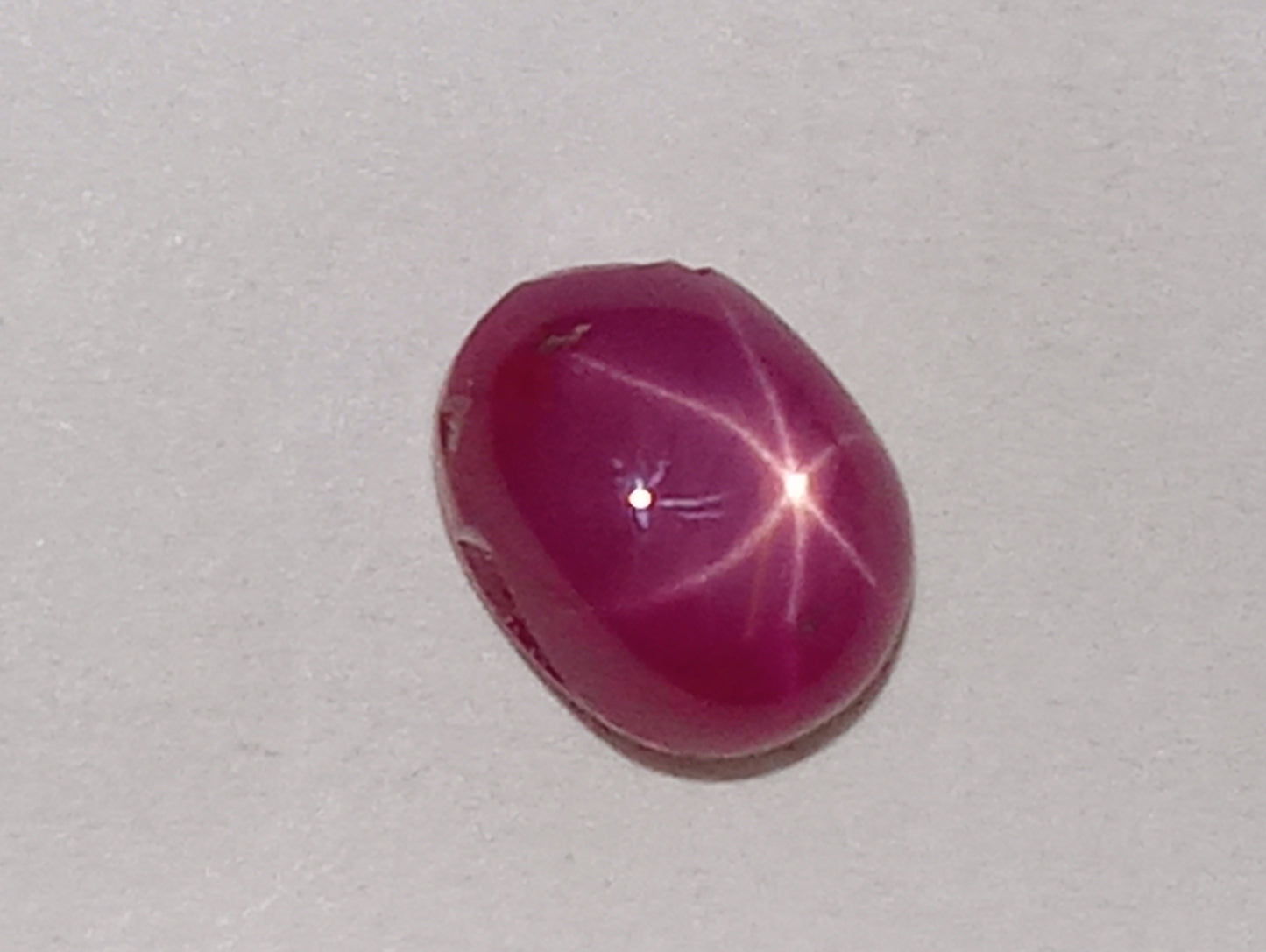 ruby gemstone Burma star, 6mmx4mm oval cabacon, 1.07ct