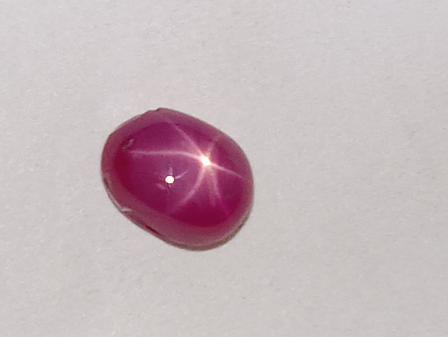 ruby gemstone Burma star, 6mmx4mm oval cabacon, 1.07ct