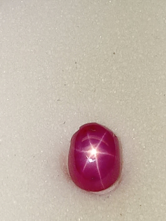 ruby gemstone Burma star, 6mmx4mm oval cabacon, 1.07ct