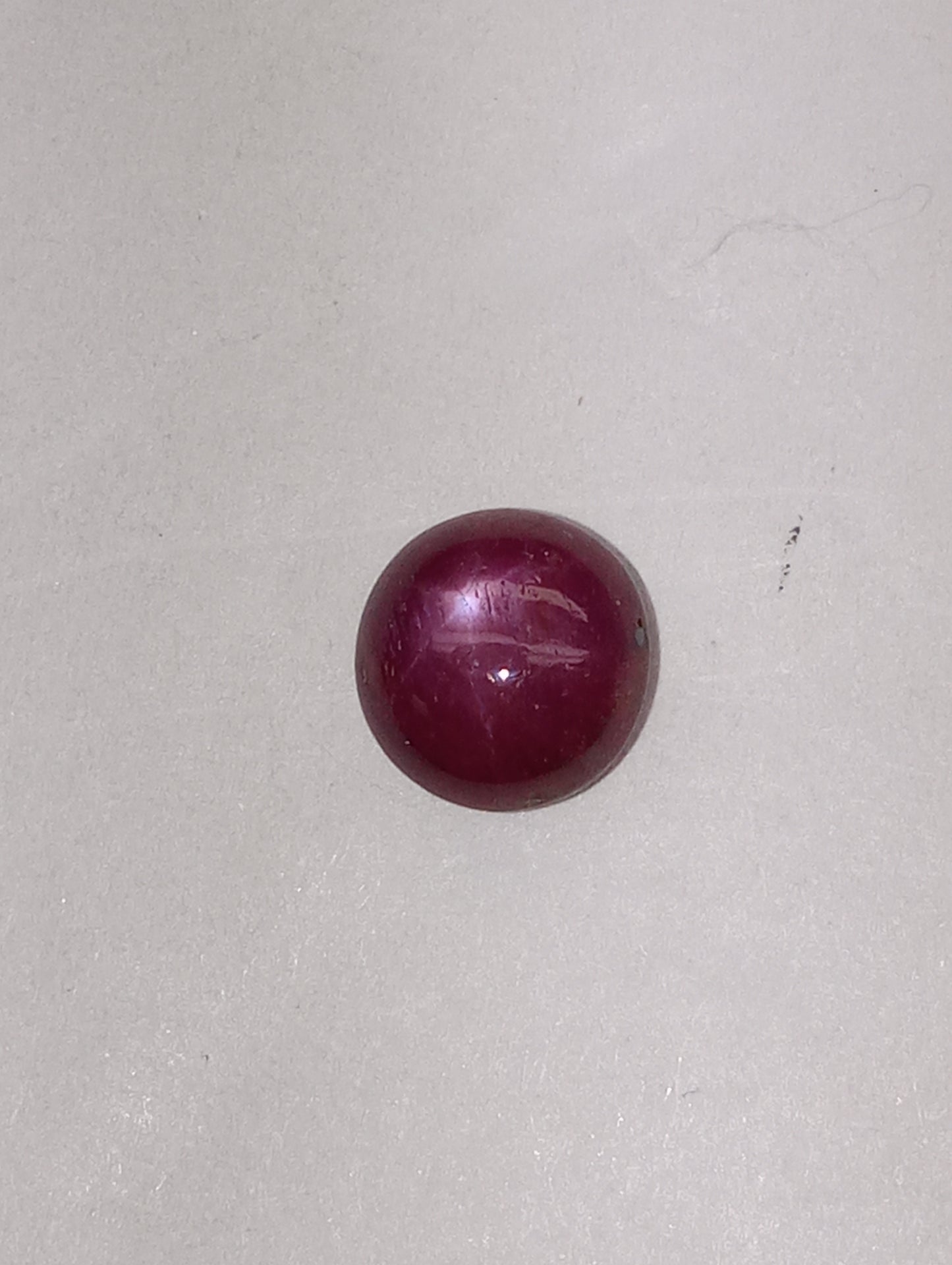 ruby gemstone star, 7mm round cab, 2.55ct
