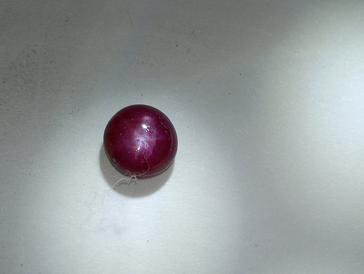 ruby gemstone star, 7mm round cab, 2.55ct