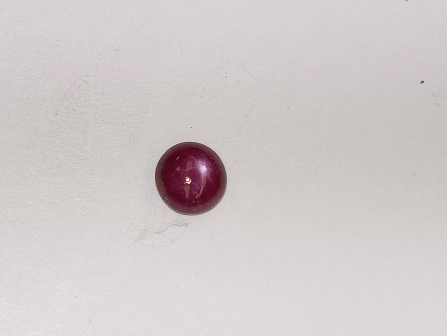 ruby gemstone star, 7mm round cab, 2.55ct