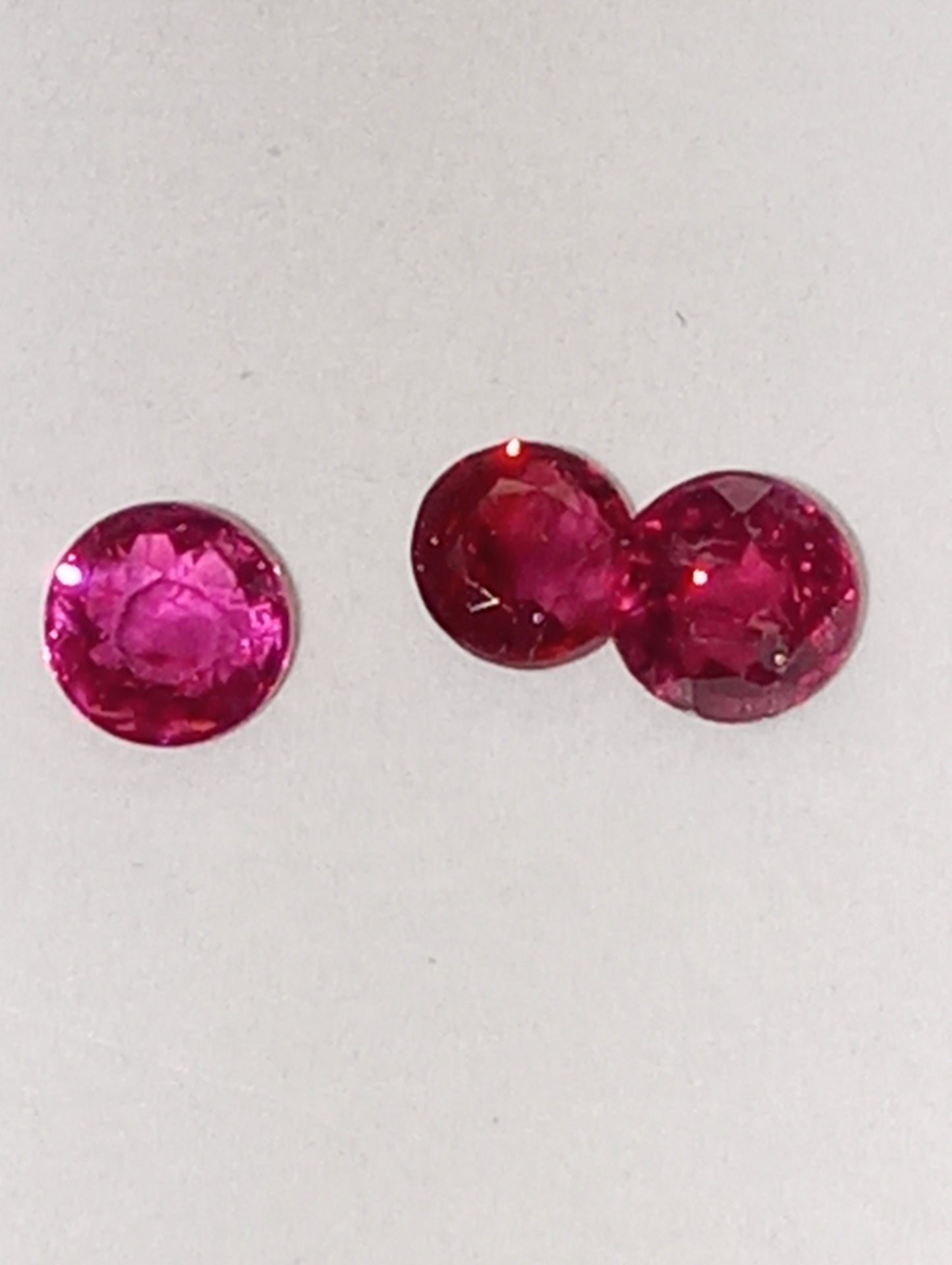 ruby gemstones, 3mm round cuts, 3 stones, .67ctw