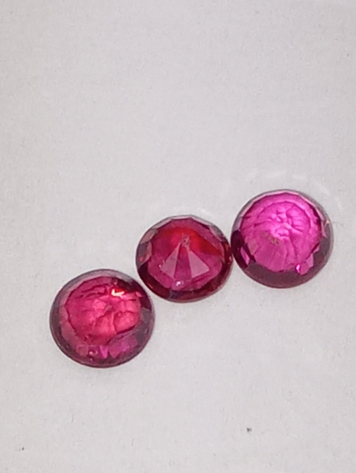 ruby gemstones, 3mm round cuts, 3 stones, .67ctw