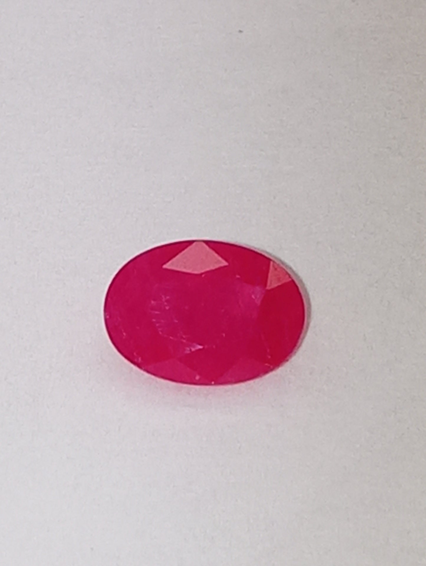 ruby gemstone Serengetti, 7mmx5mm oval cut, 1.07ct