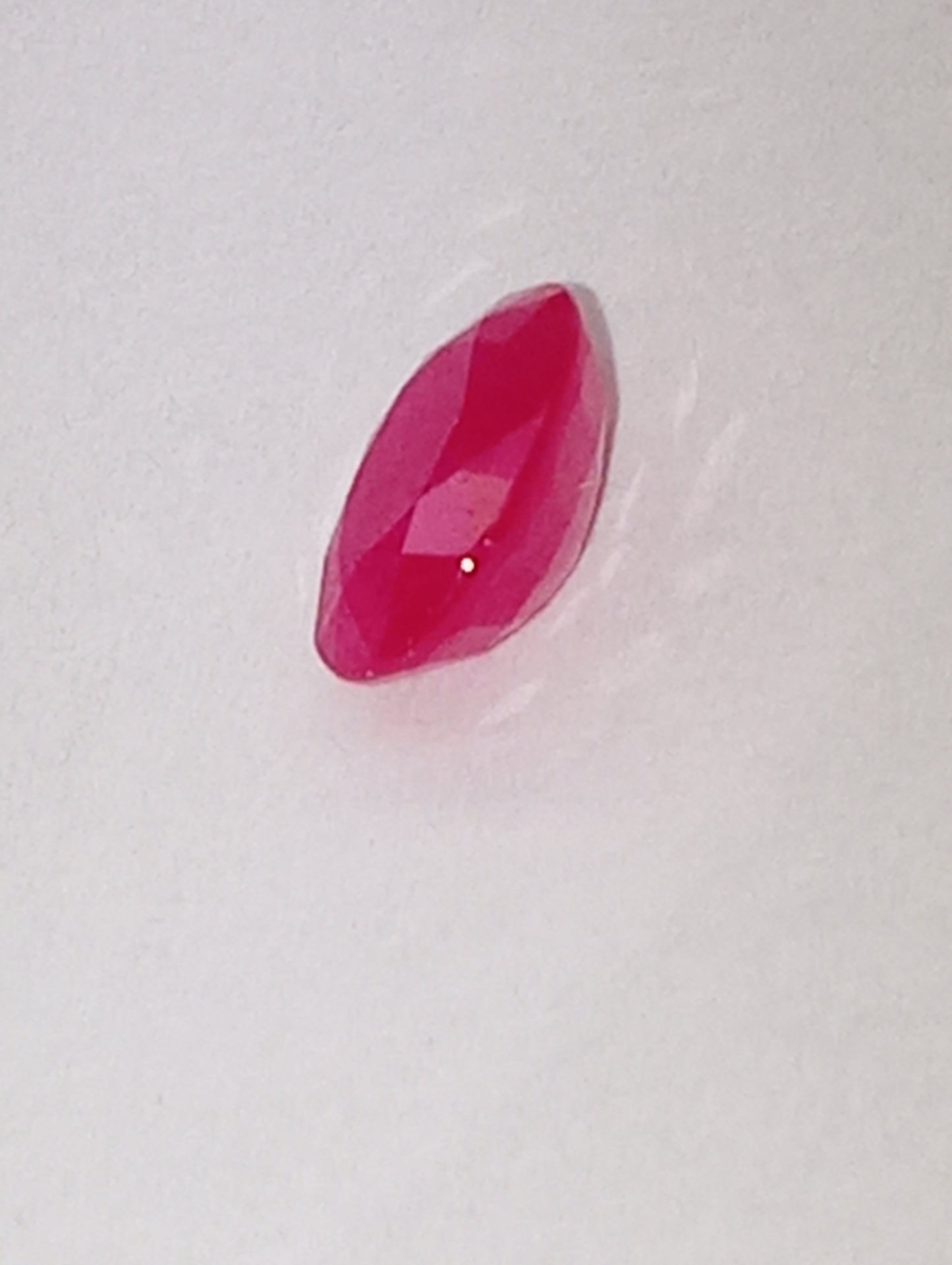 ruby gemstone Serengetti, 7mmx5mm oval cut, 1.19ct
