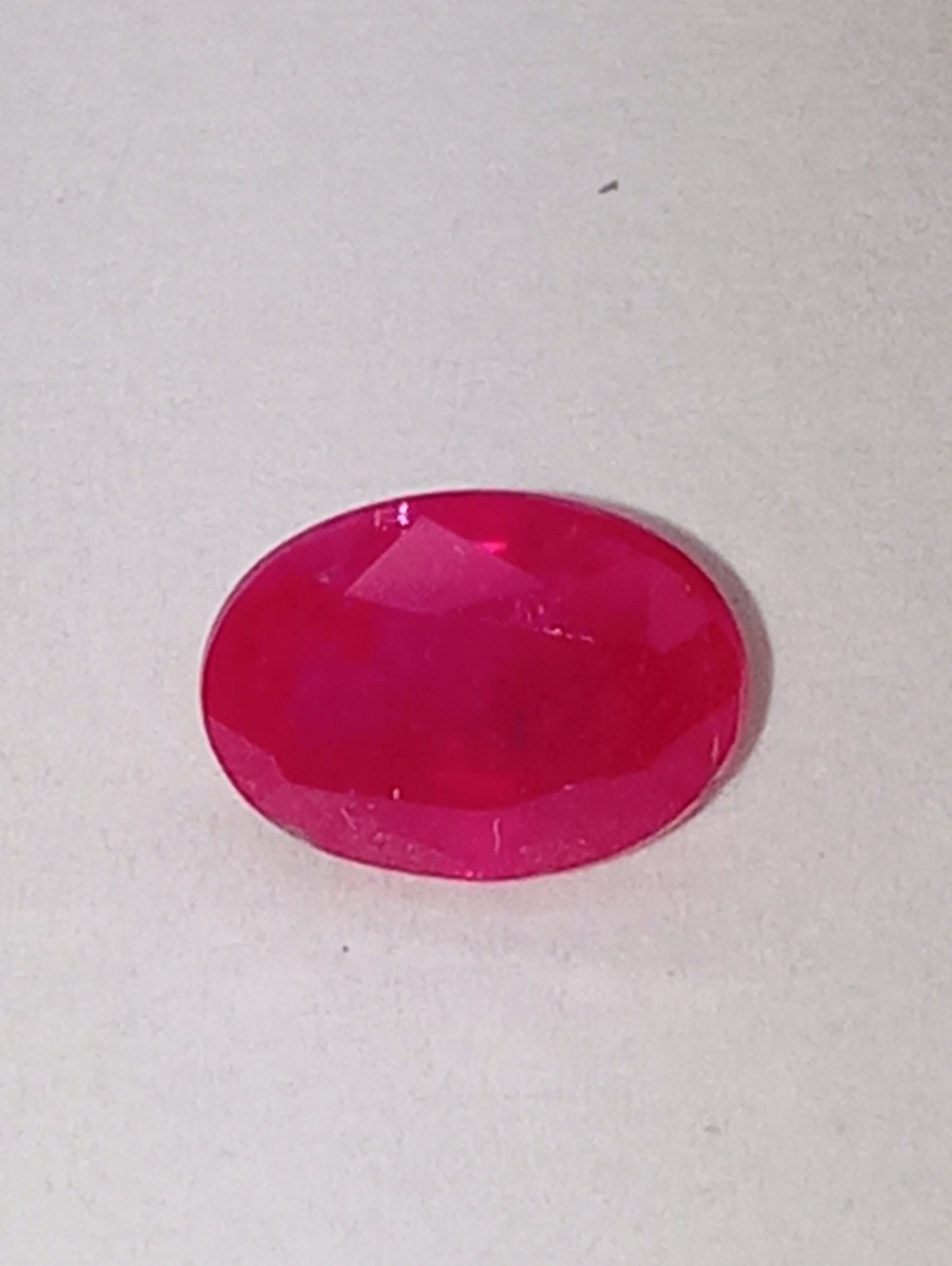 ruby gemstone Serengetti, 7mmx5mm oval cut, 1.07ct