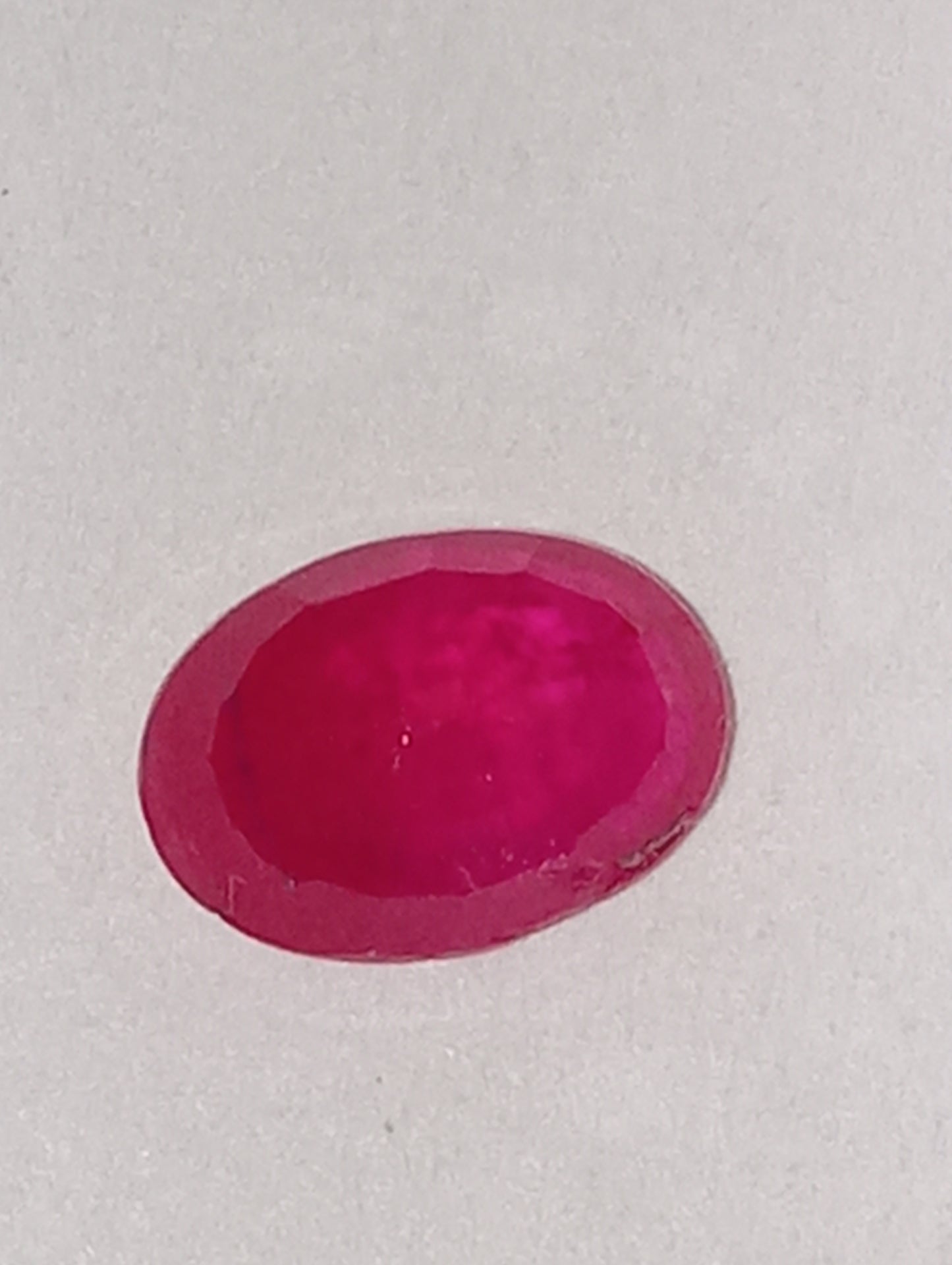 ruby gemstone Serengetti, 7mmx5mm oval cut, 1.19ct