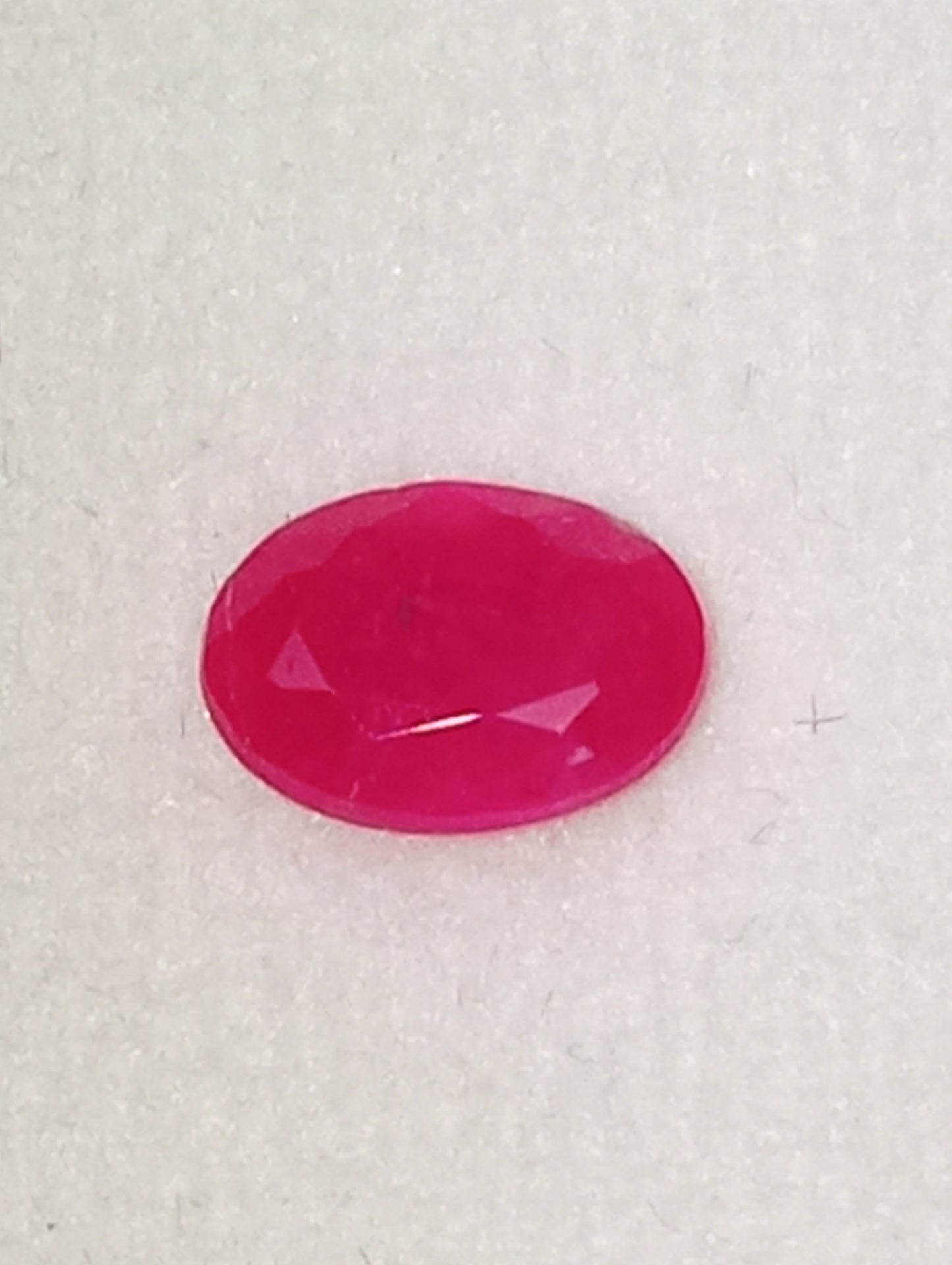 ruby gemstone Serengetti, 7mmx5mm oval cut, 1.19ct