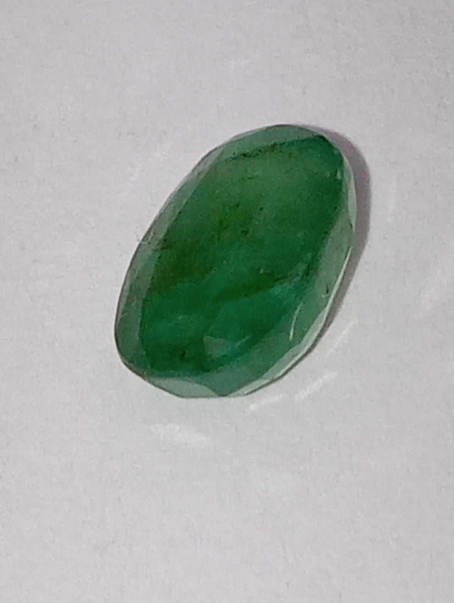 emerald gemstone, 7mmx5mm oval cut, .91ct