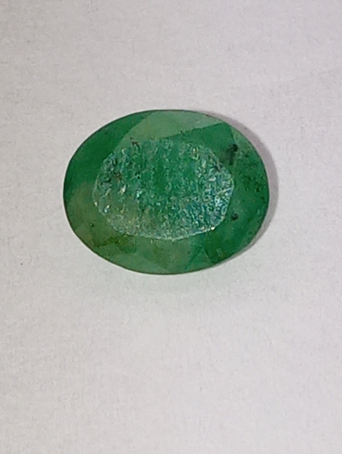 emerald gemstone, 7mmx5mm oval cut,.97ct