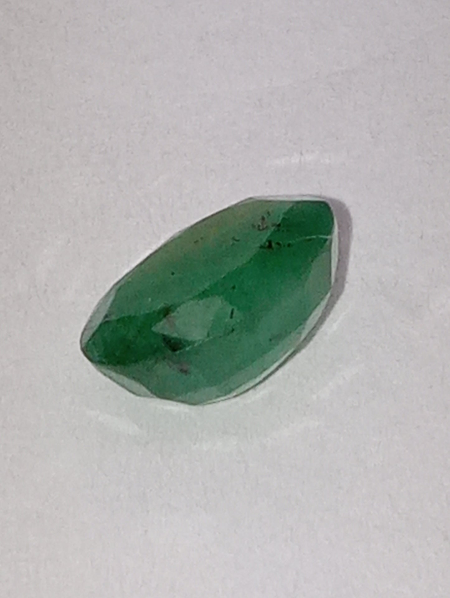 emerald gemstone, 7mmx5mm oval cut,.97ct