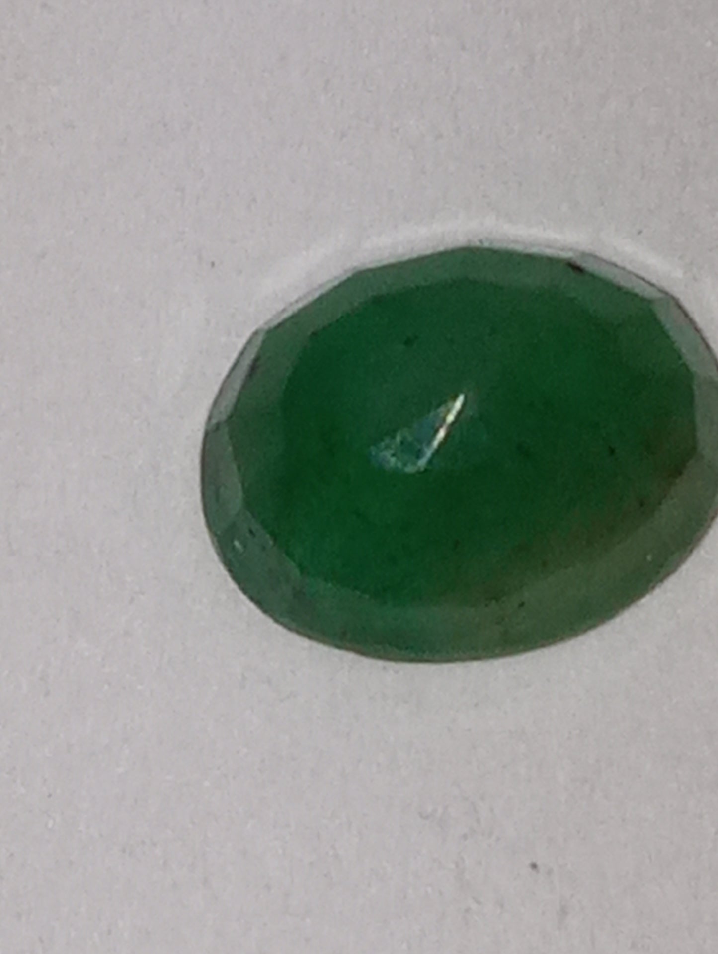 emerald gemstone, 7mmx5mm oval cut,.97ct