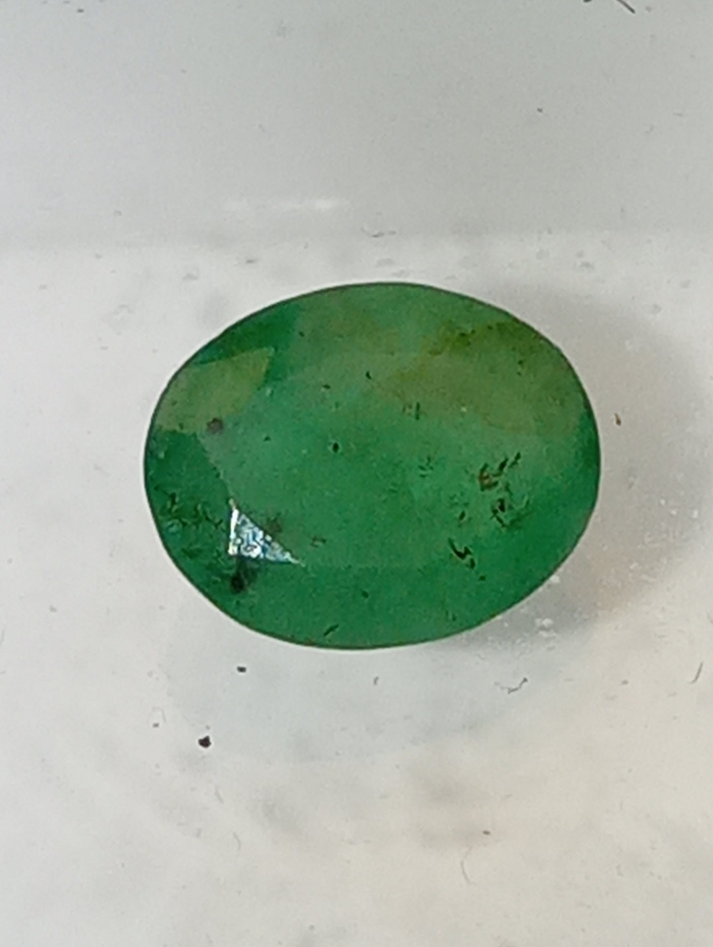 emerald gemstone, 7mmx5mm oval cut,.97ct