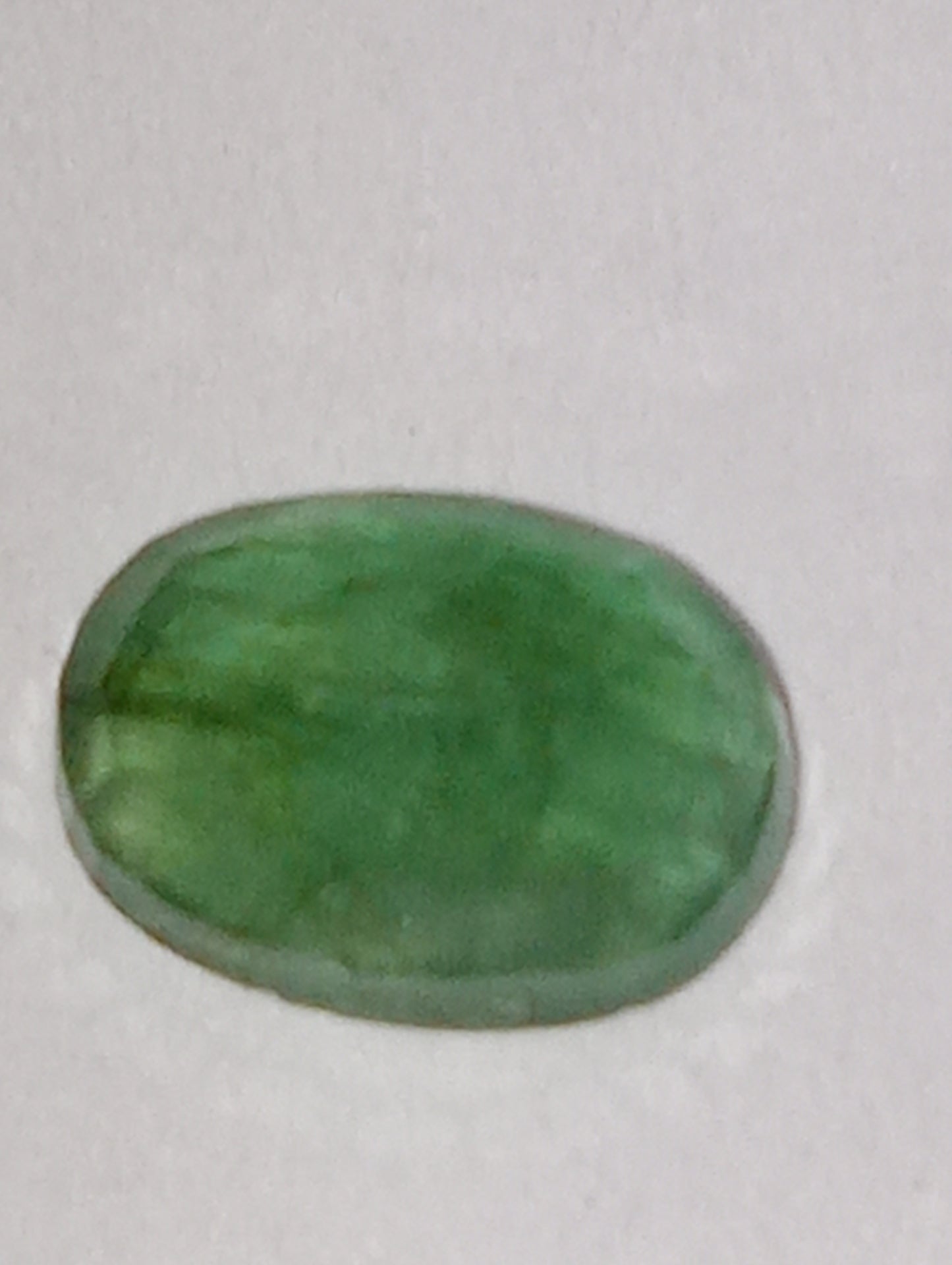 emerald gemstone, 7mmx5mm oval cut, .92ct