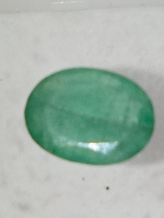 emerald gemstone, 7mmx5mm oval cut, .72ct