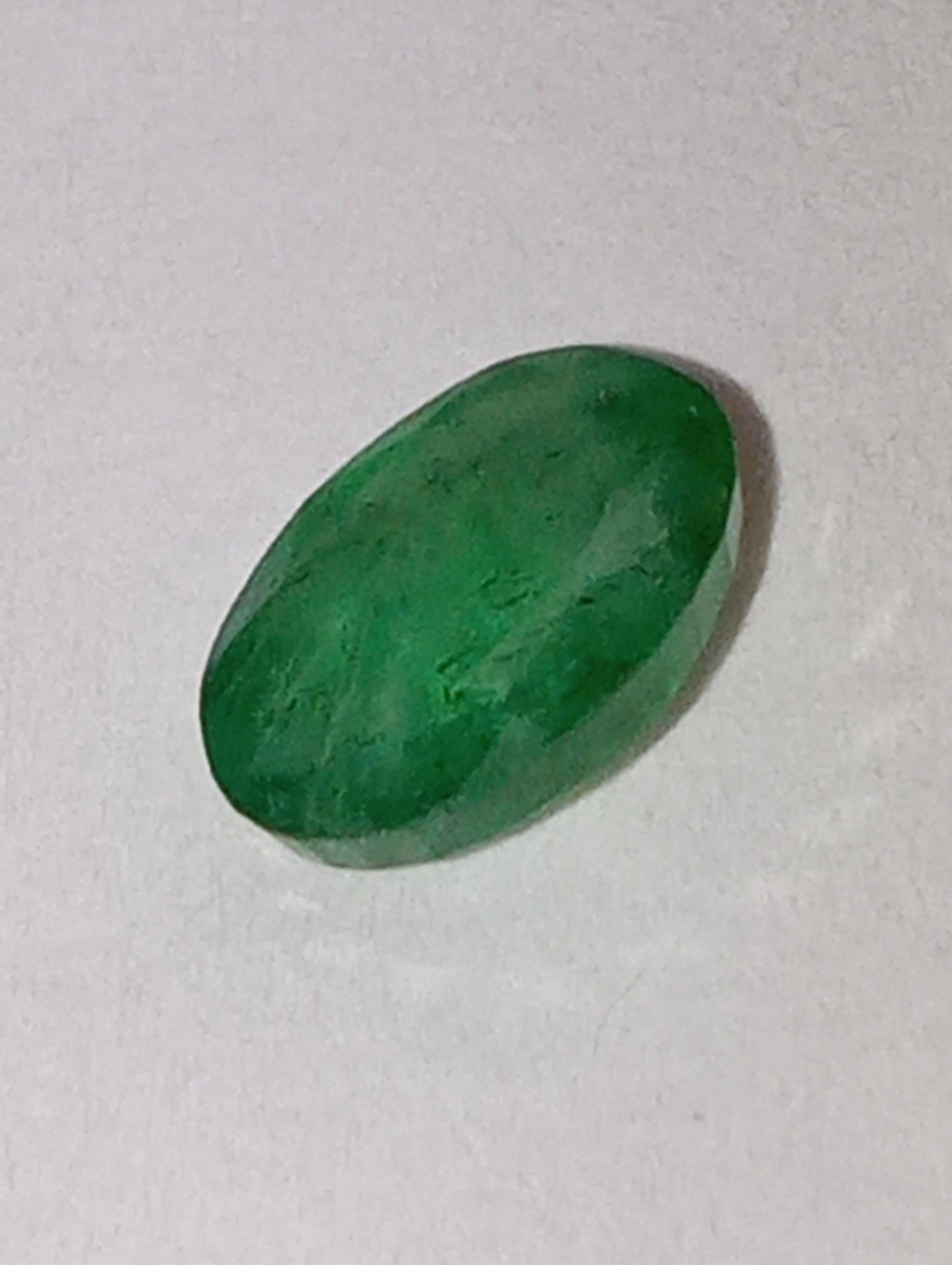 emerald gemstone, 7mmx5mm oval cut, .65ct